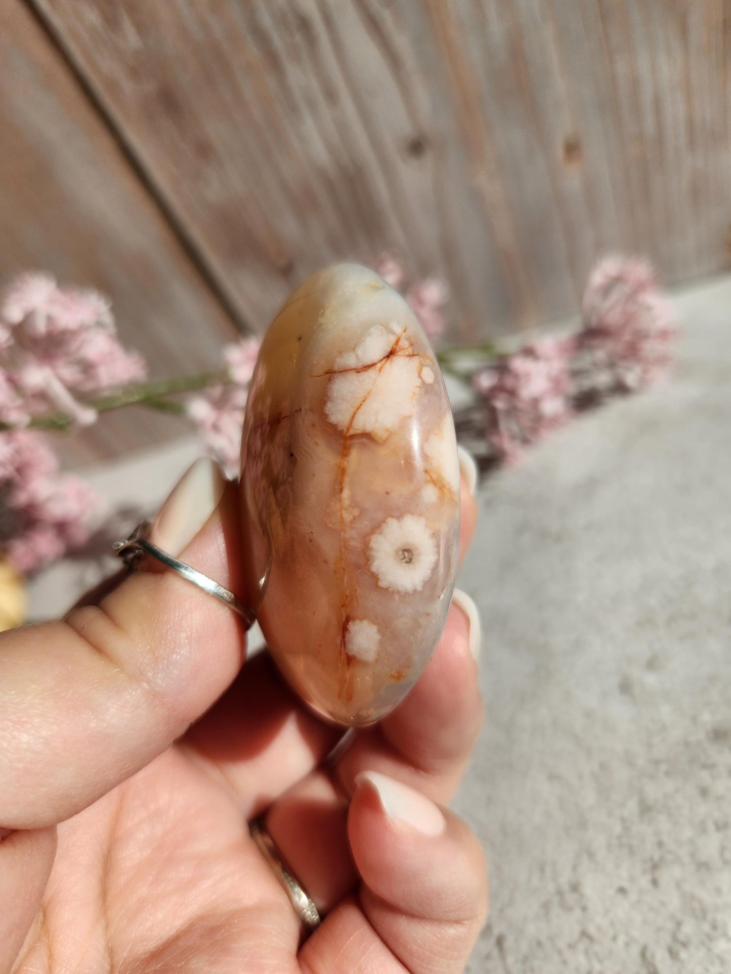 Amazing natural rare carnelian flower agate palm stone with pink flowers from Madagascar, cherry blossoms, translucent