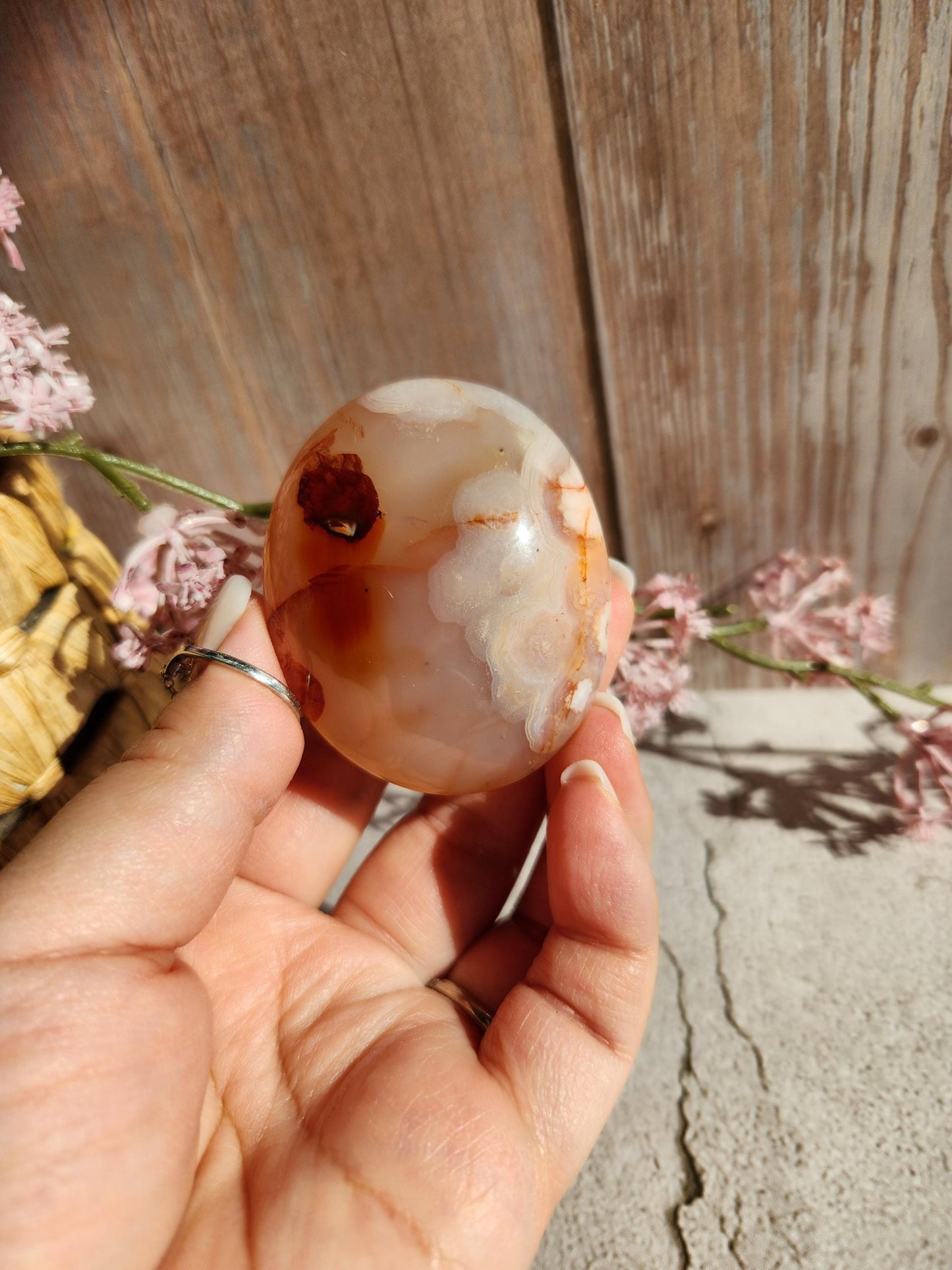 Amazing natural rare carnelian flower agate palm stone with pink flowers from Madagascar, cherry blossoms, translucent