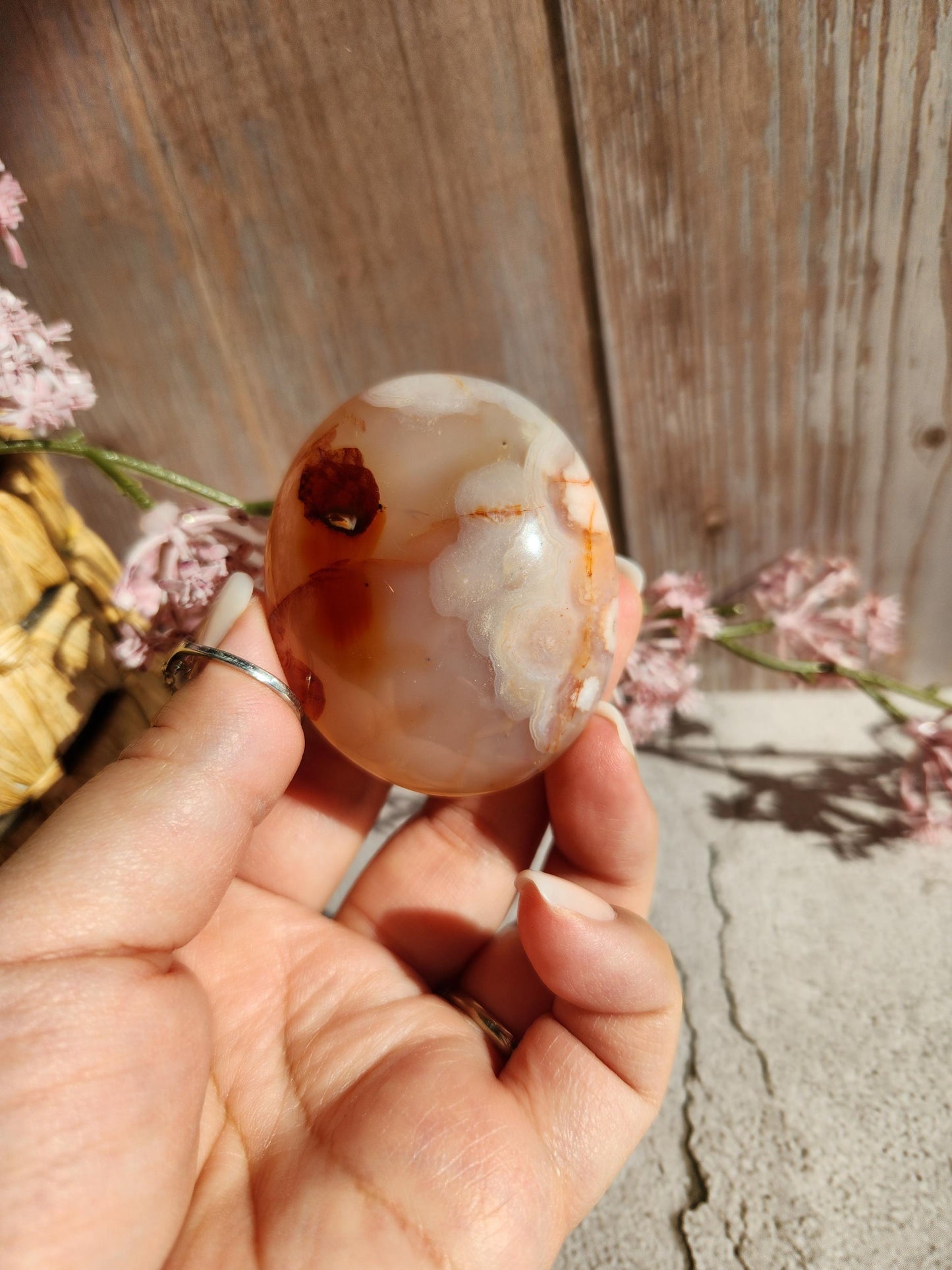 Amazing natural rare carnelian flower agate palm stone with pink flowers from Madagascar, cherry blossoms, translucent