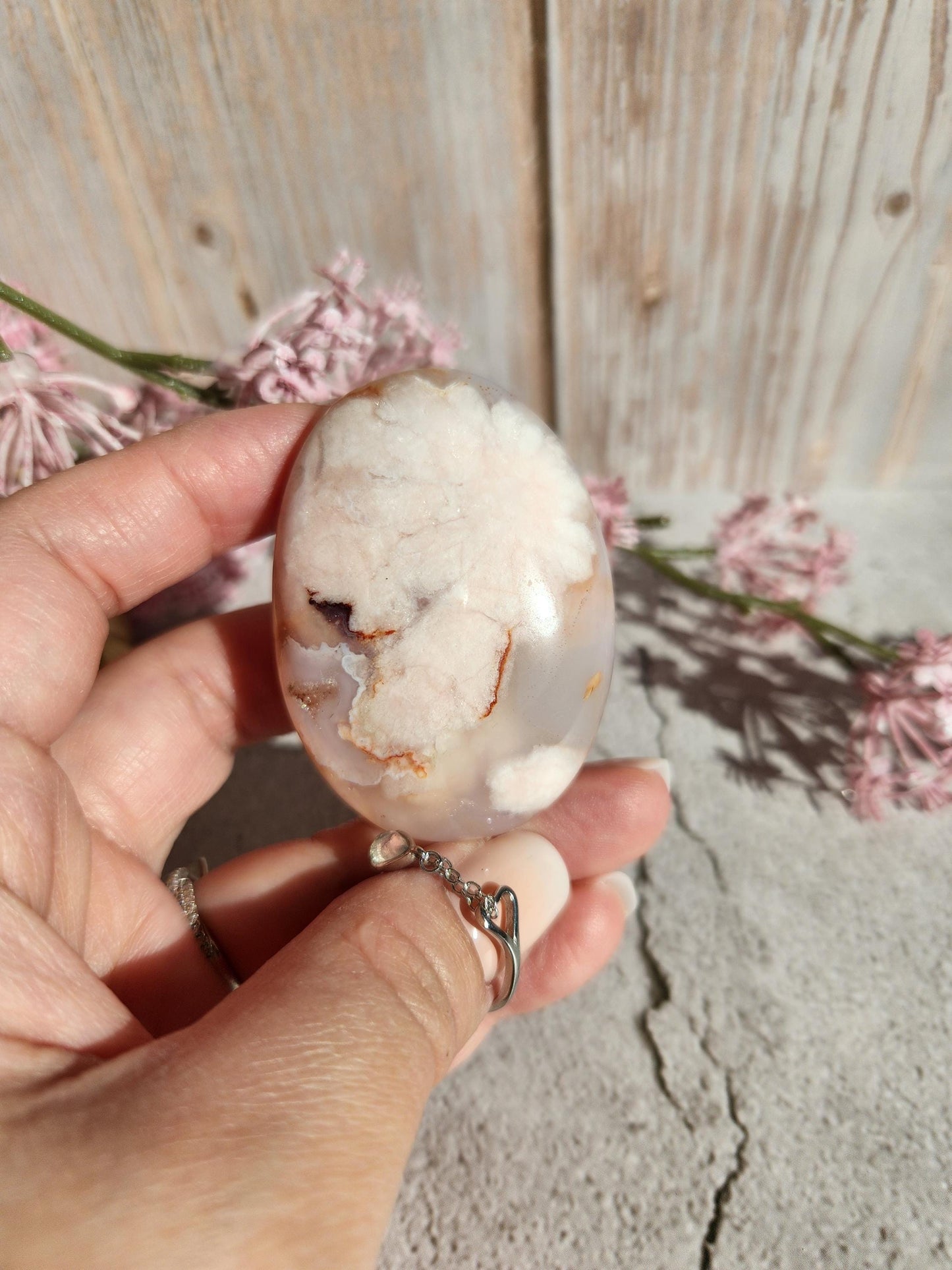 Beautiful natural carnelian flower agate palm stone with sparkly flowers from Madagascar, cherry blossoms