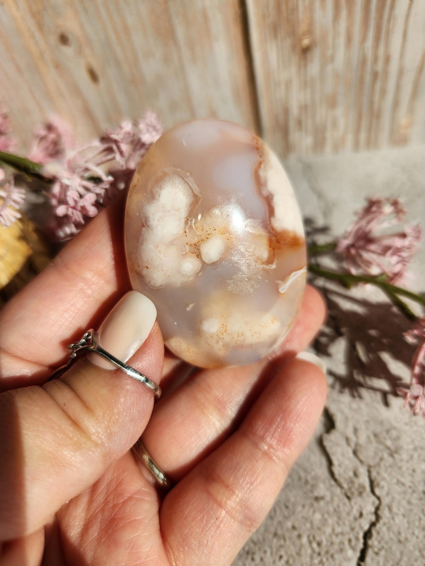Beautiful natural carnelian flower agate palm stone with sparkly flowers from Madagascar, cherry blossoms