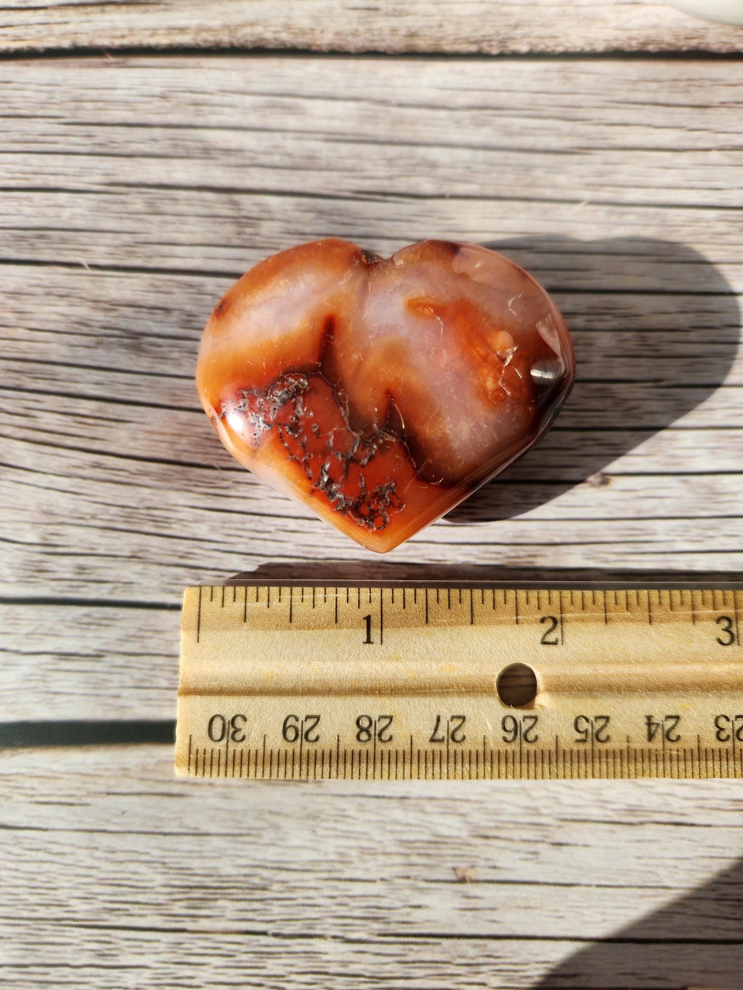 Beautiful carnelian heart carving from Madagascar with pretty patterns, natural