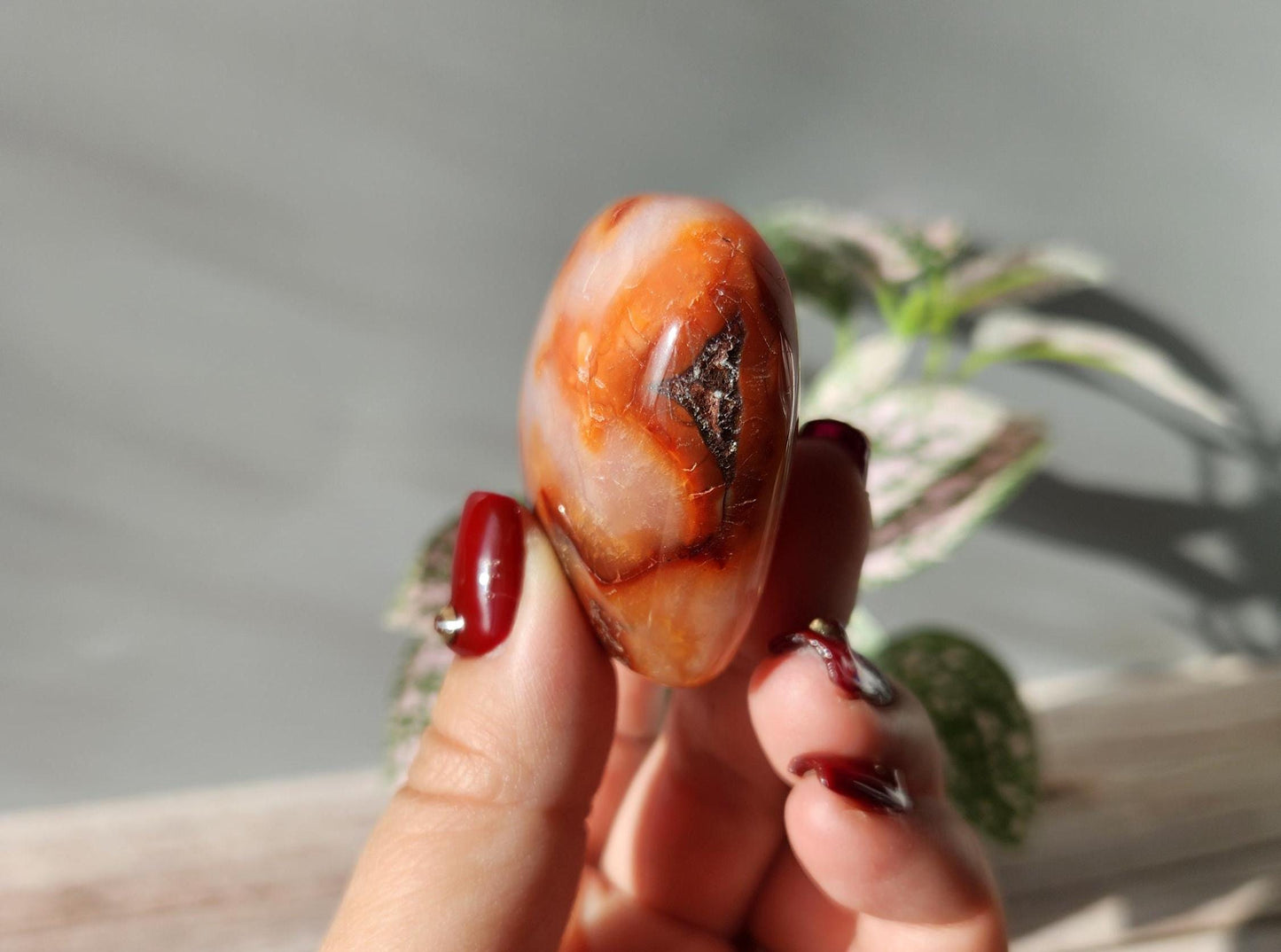 Beautiful carnelian heart carving from Madagascar with pretty patterns, natural