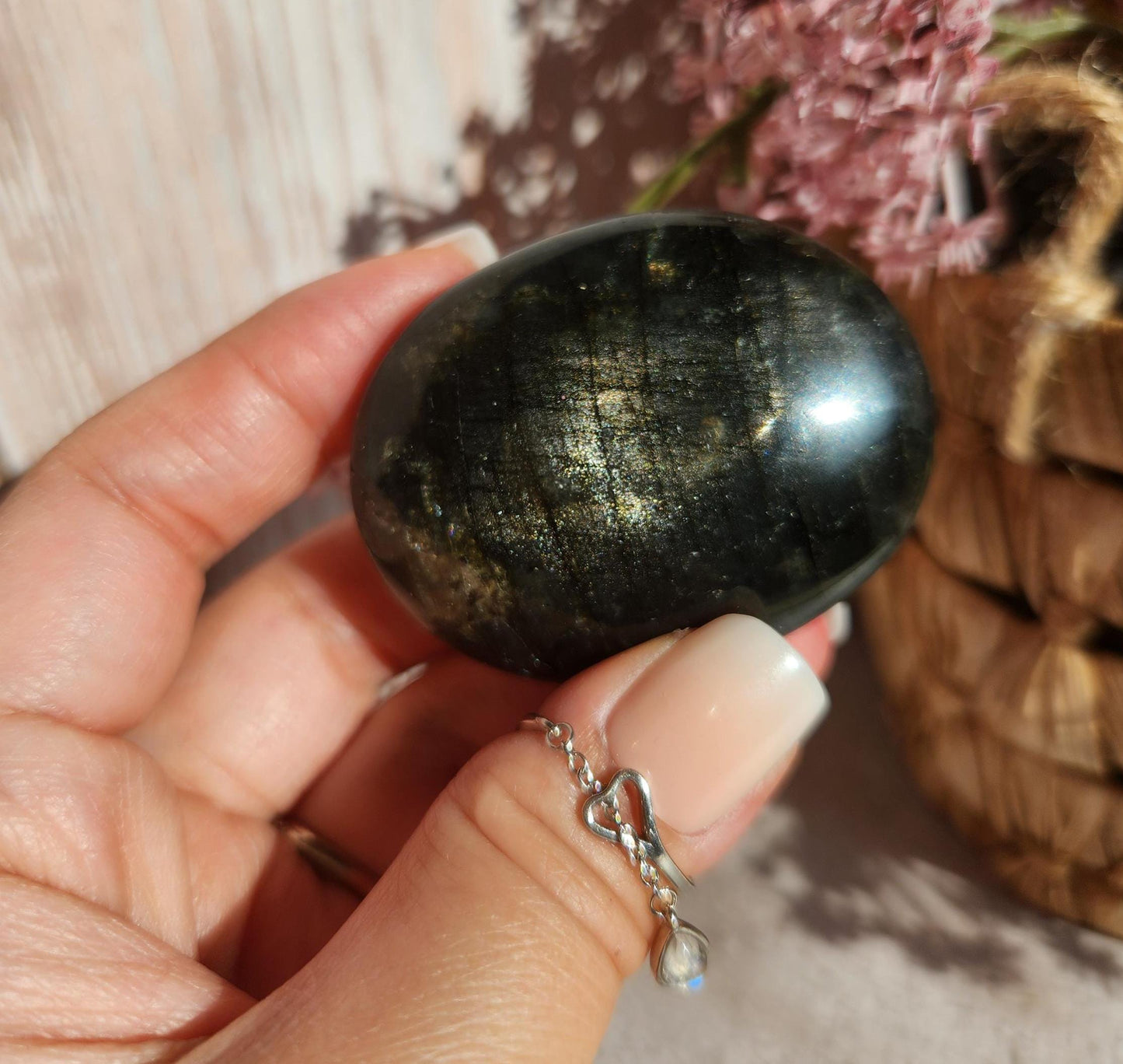 Beautiful bright silver and purple labradorite palm stone from Finland