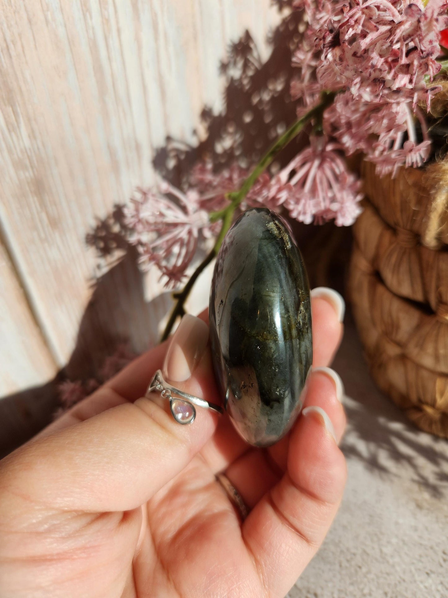 Stunning blue, silver purple labradorite palm stone from Finland