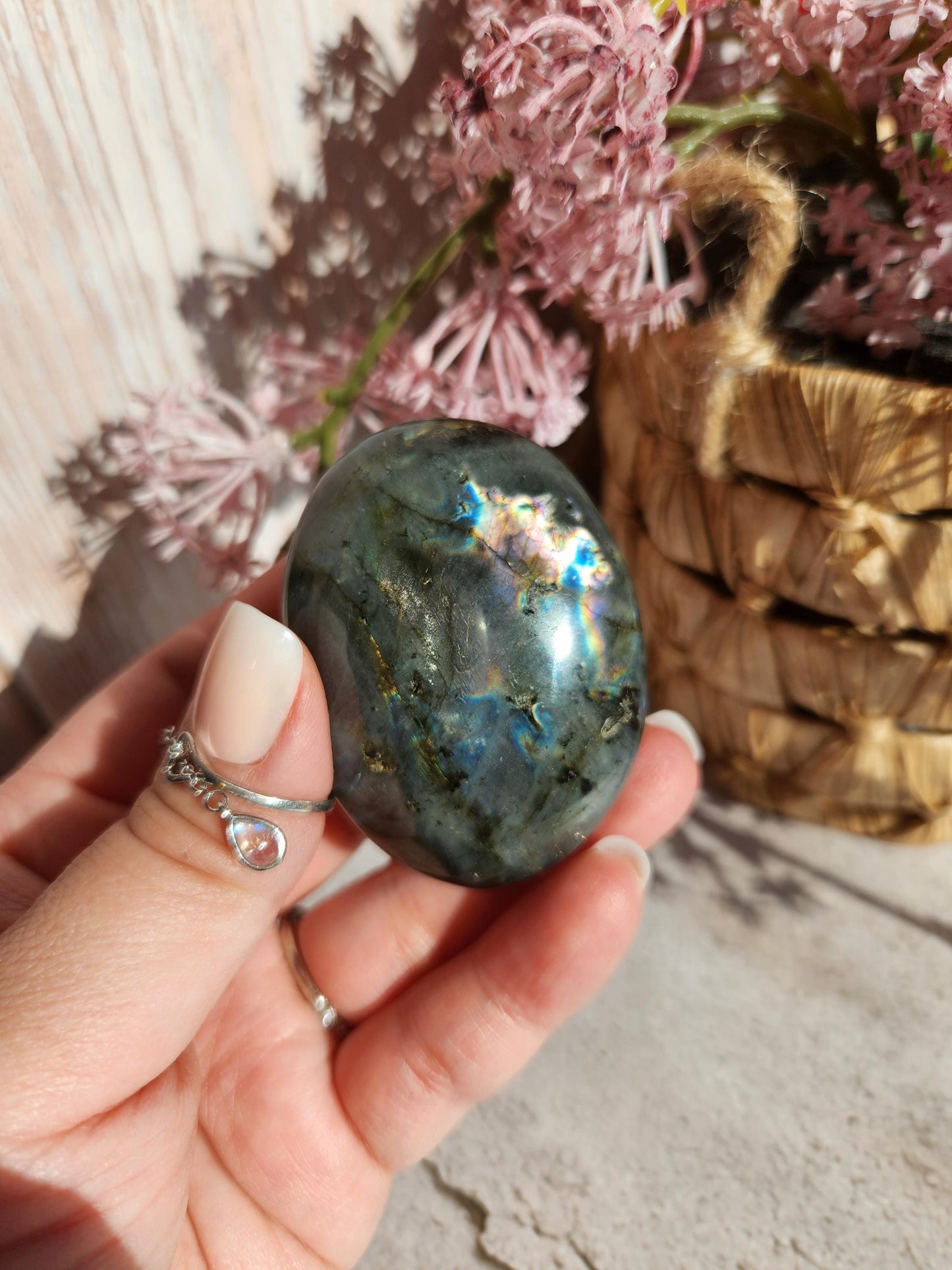 Stunning blue, silver purple labradorite palm stone from Finland