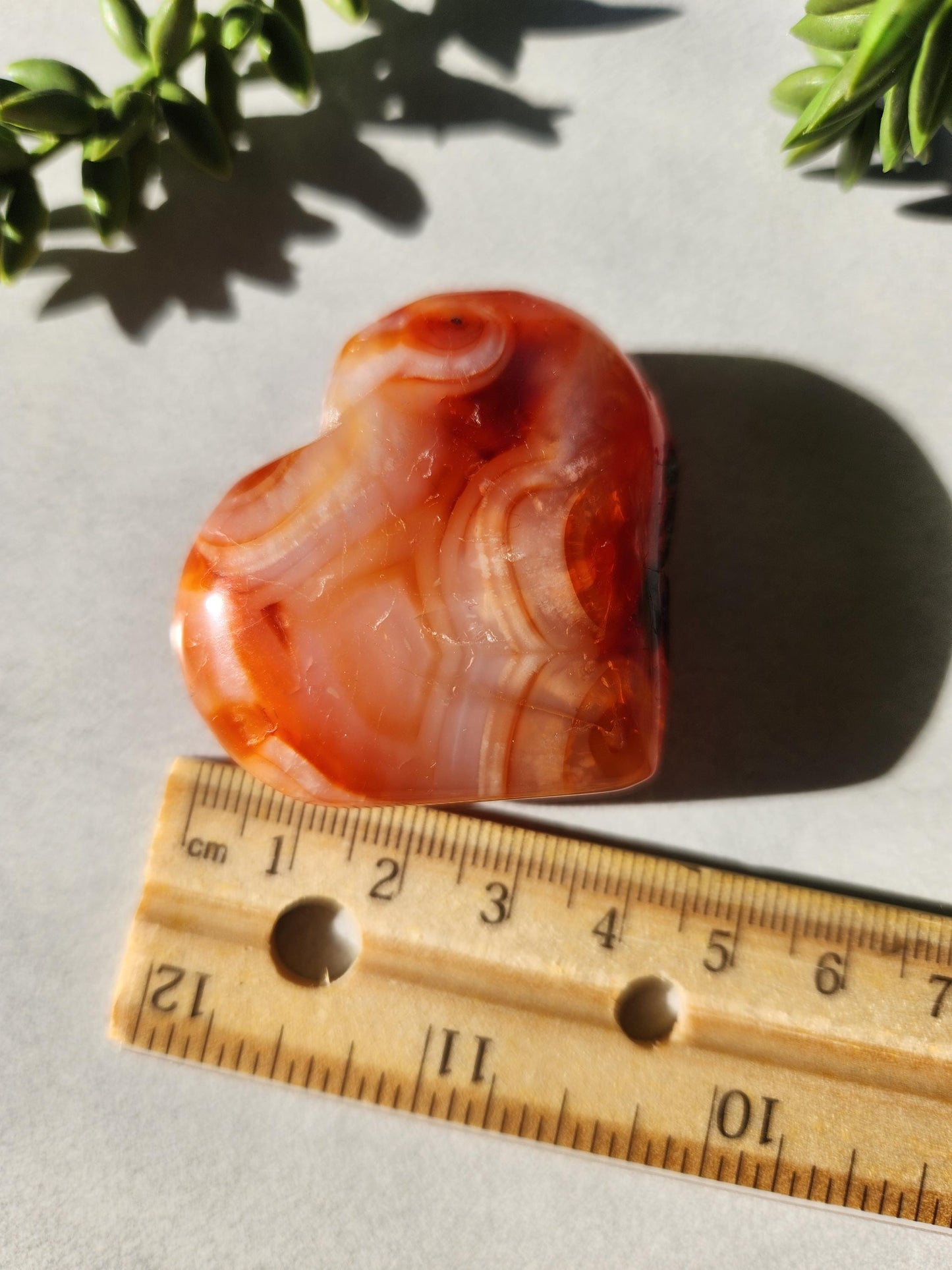 Beautiful carnelian heart carving from Madagascar with pretty patterns, natural