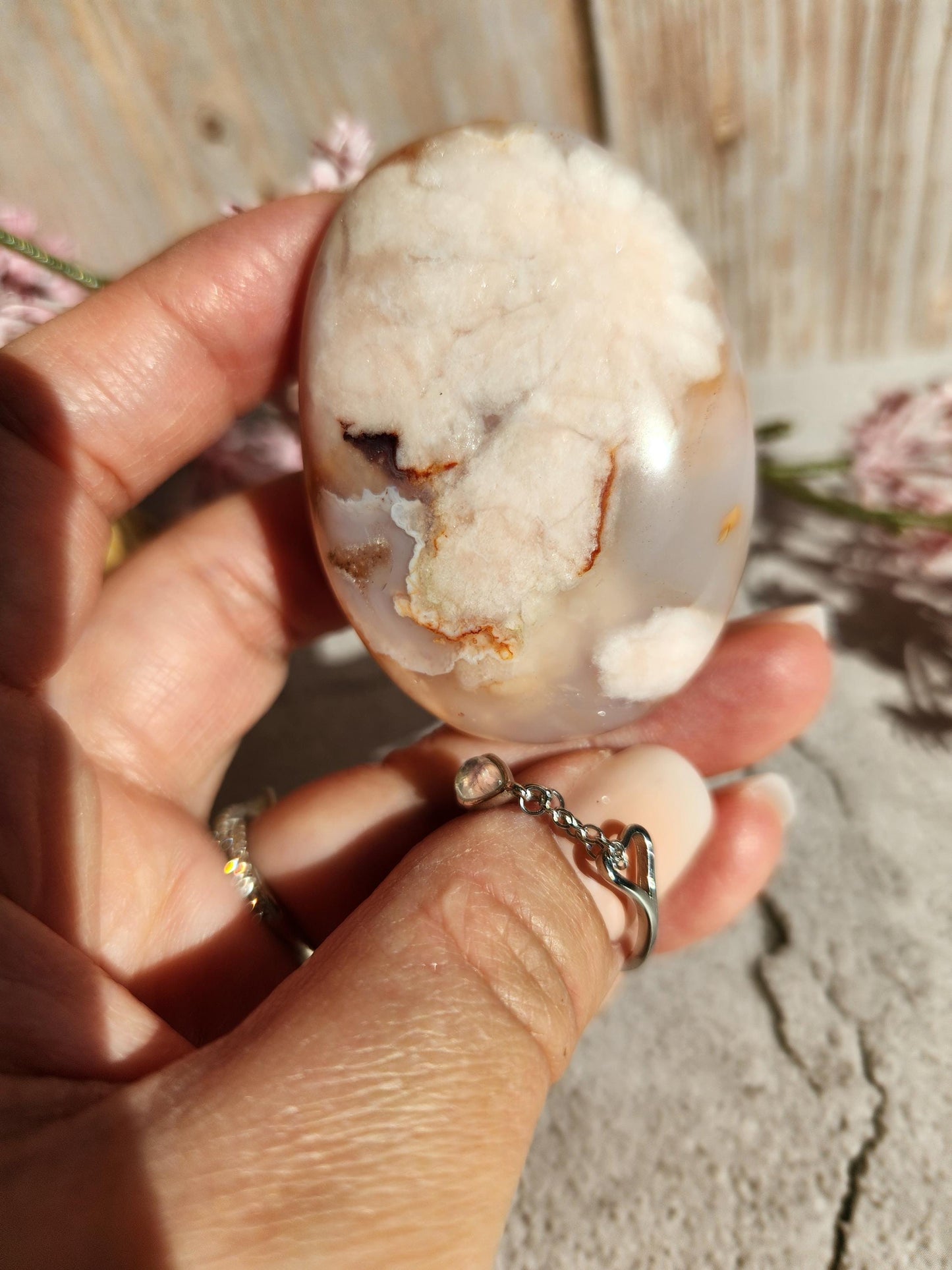 Beautiful natural carnelian flower agate palm stone with sparkly flowers from Madagascar, cherry blossoms