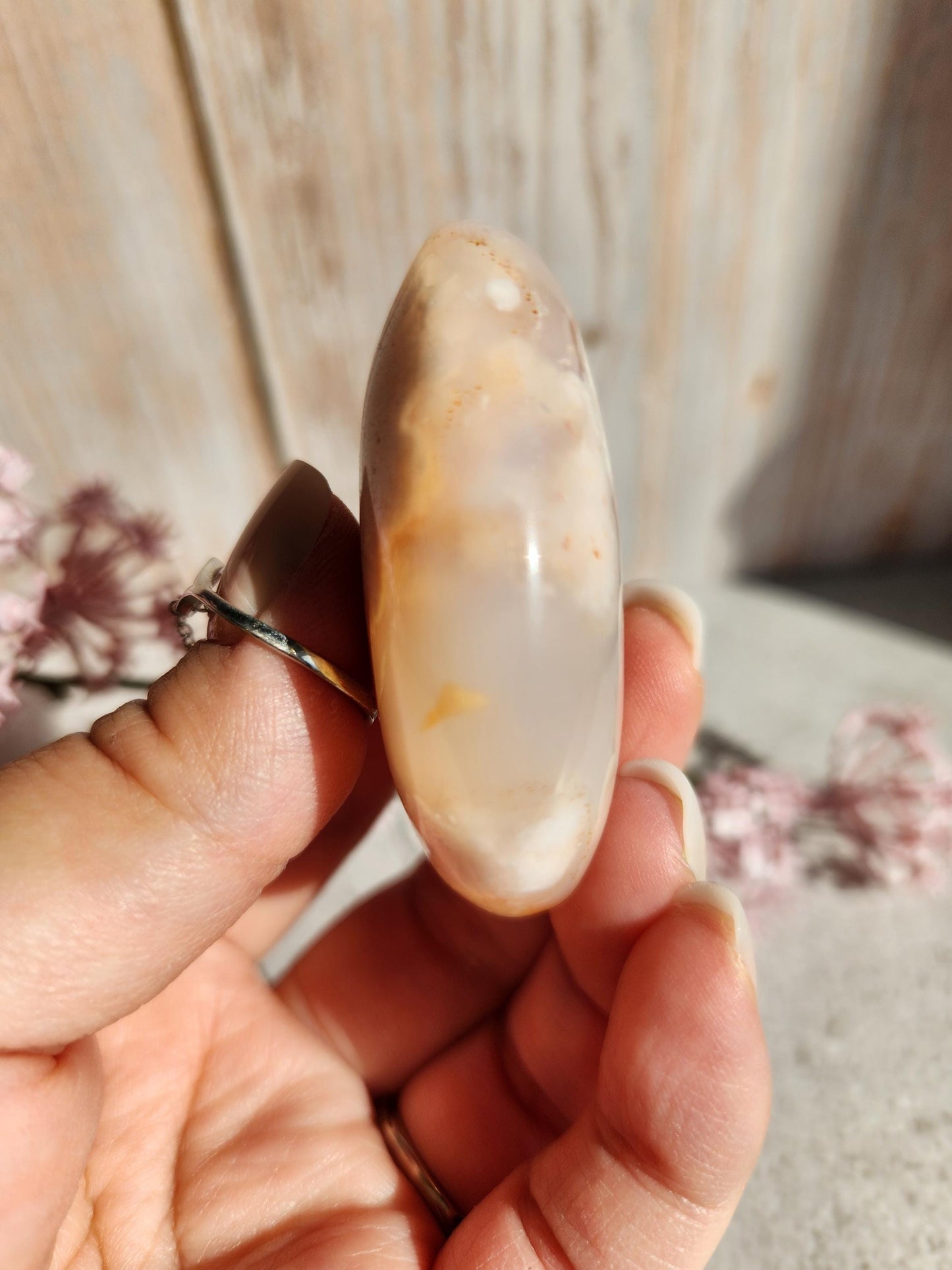 Beautiful natural carnelian flower agate palm stone with sparkly flowers from Madagascar, cherry blossoms