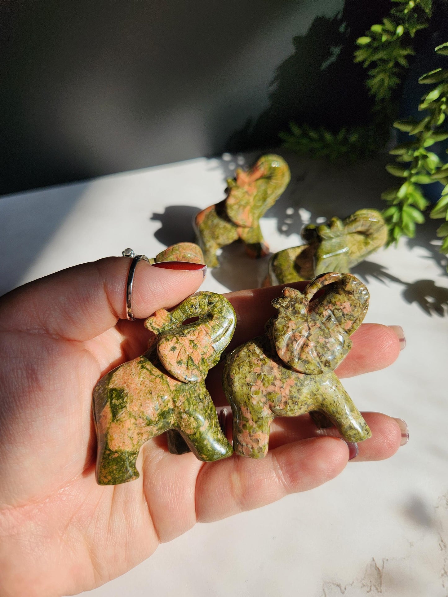 Beautiful hand carved unakite elephants, natural unakite