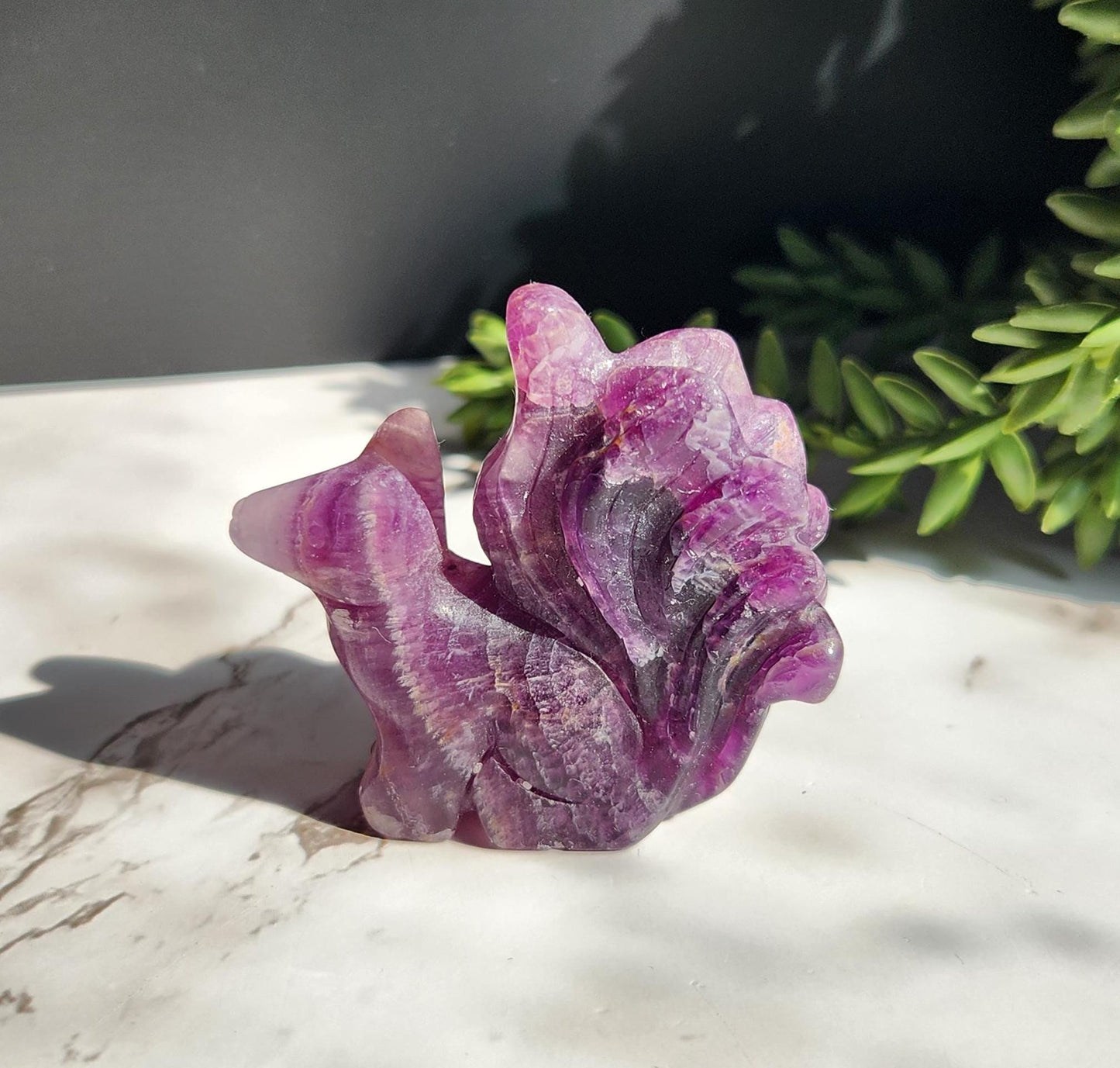 Natural purple fluorite 9 tail fox carving with beautiful bandings
