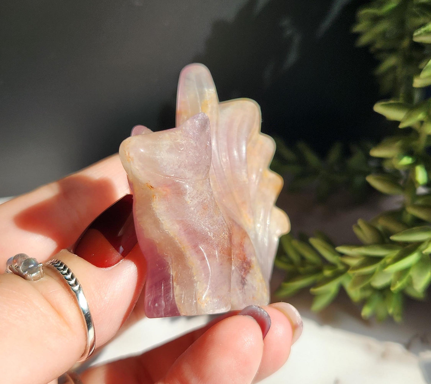 Natural fluorite 9 tail fox carving with golden healer inclusions