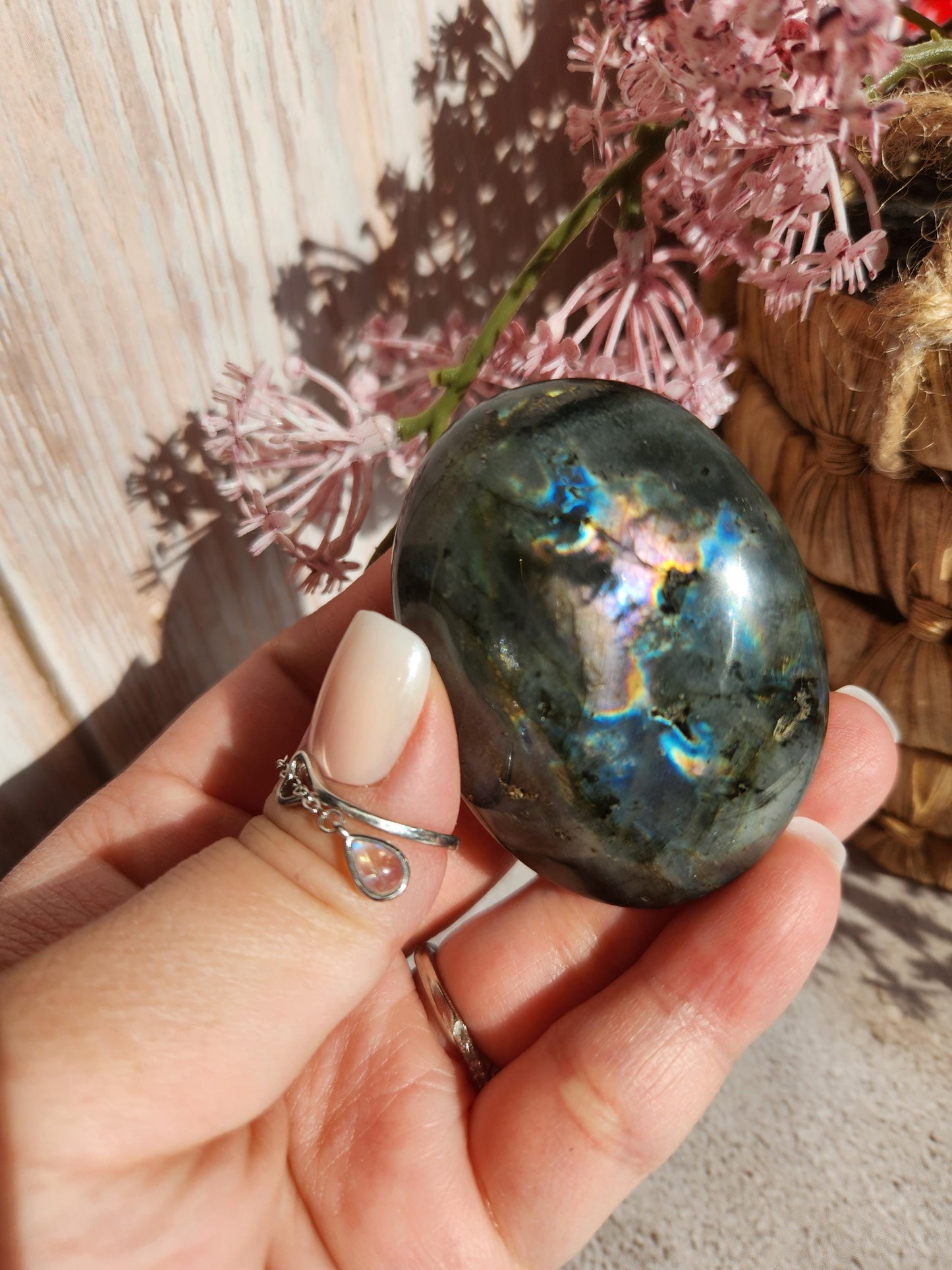 Stunning blue, silver purple labradorite palm stone from Finland