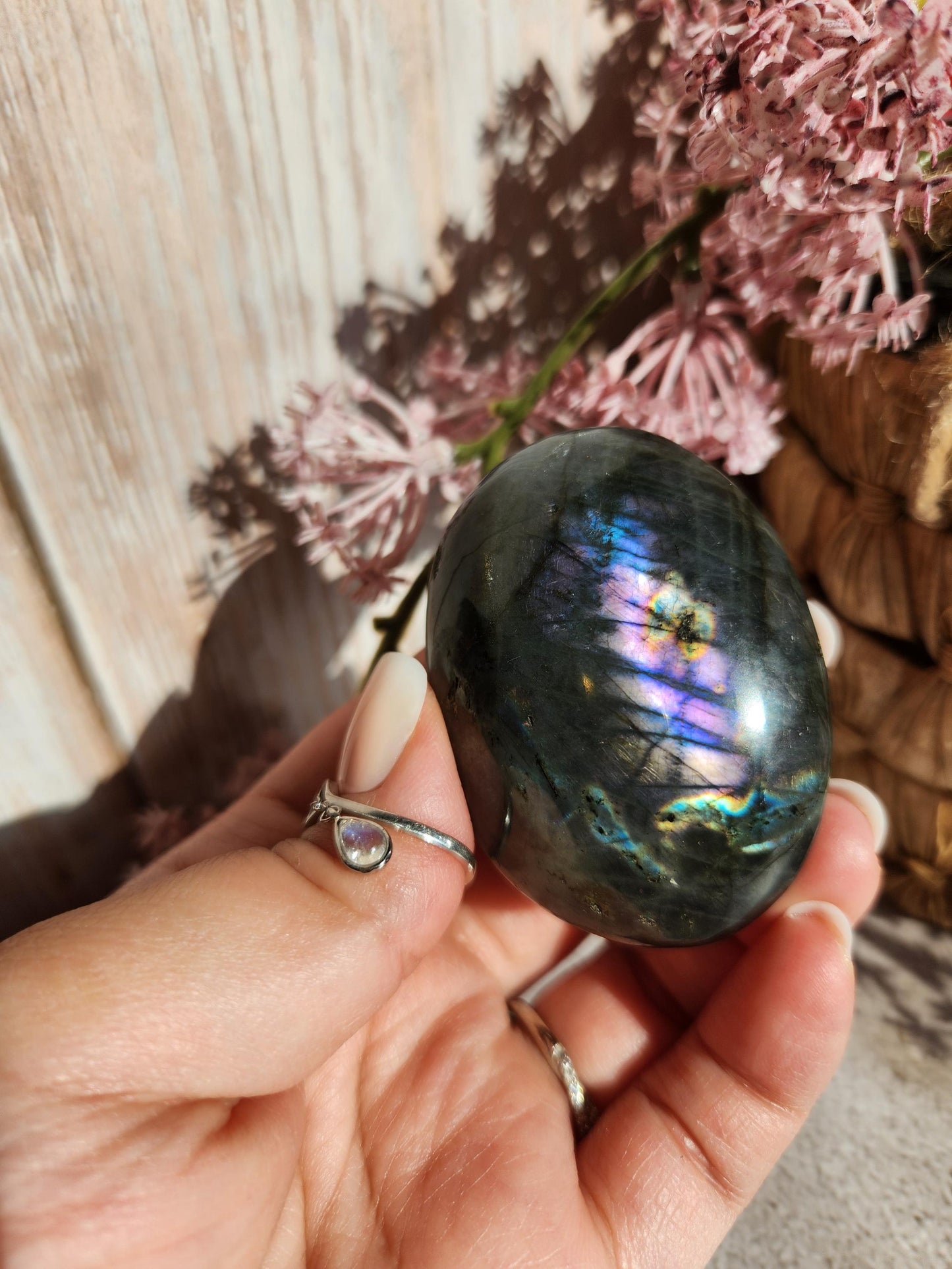 Stunning blue, silver purple labradorite palm stone from Finland