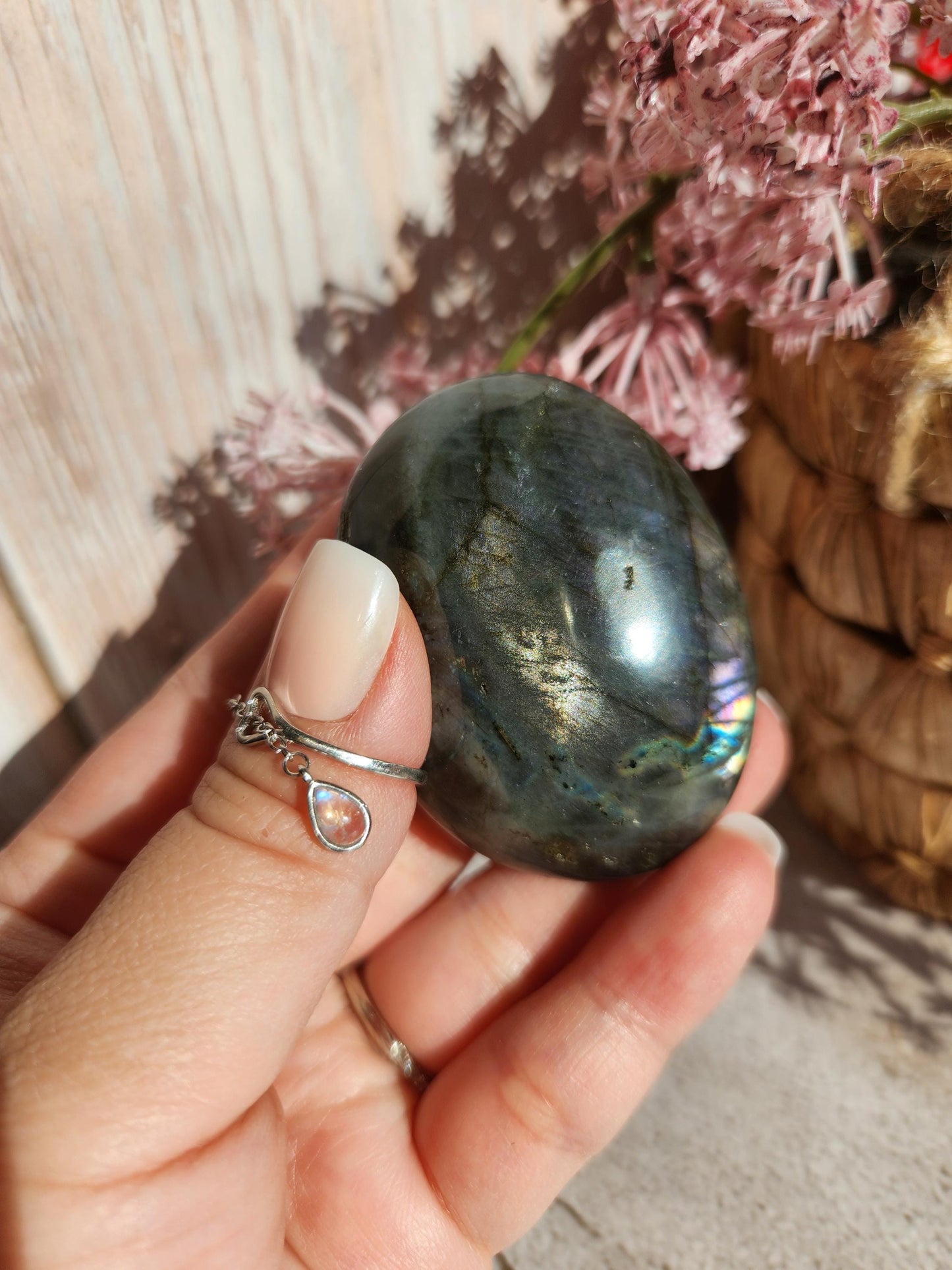 Stunning blue, silver purple labradorite palm stone from Finland