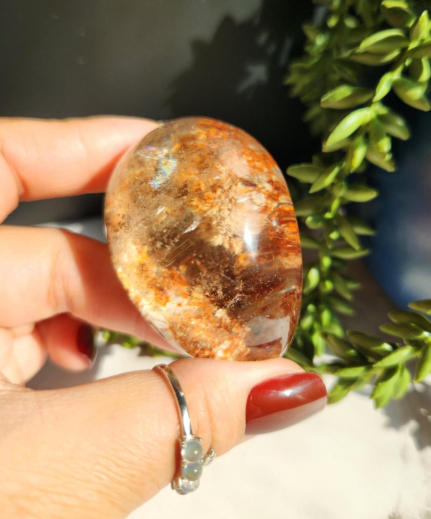 Natural lodolite garden quartz lens from Brazil, half polish and half raw