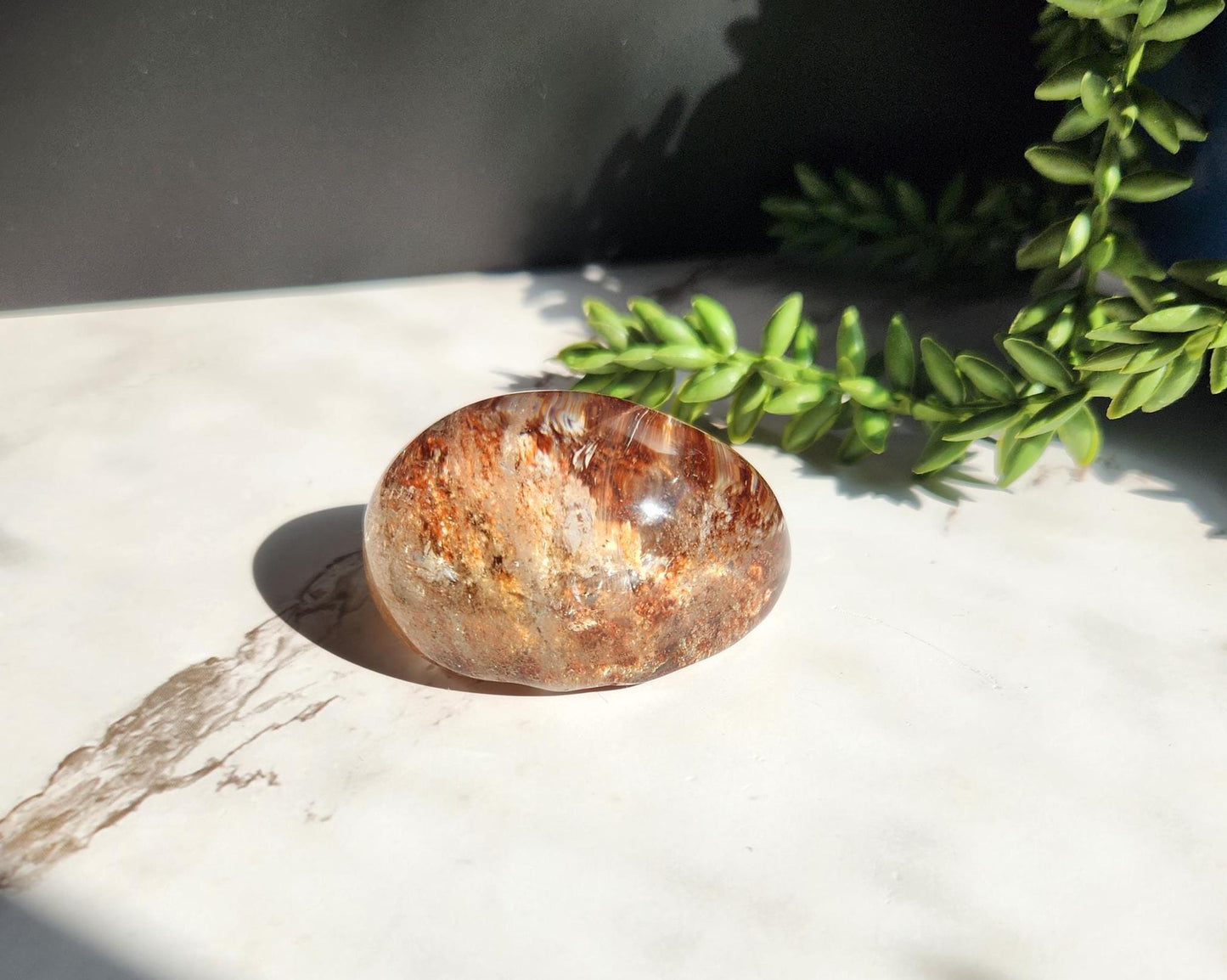 Natural lodolite garden quartz lens from Brazil, half polish and half raw