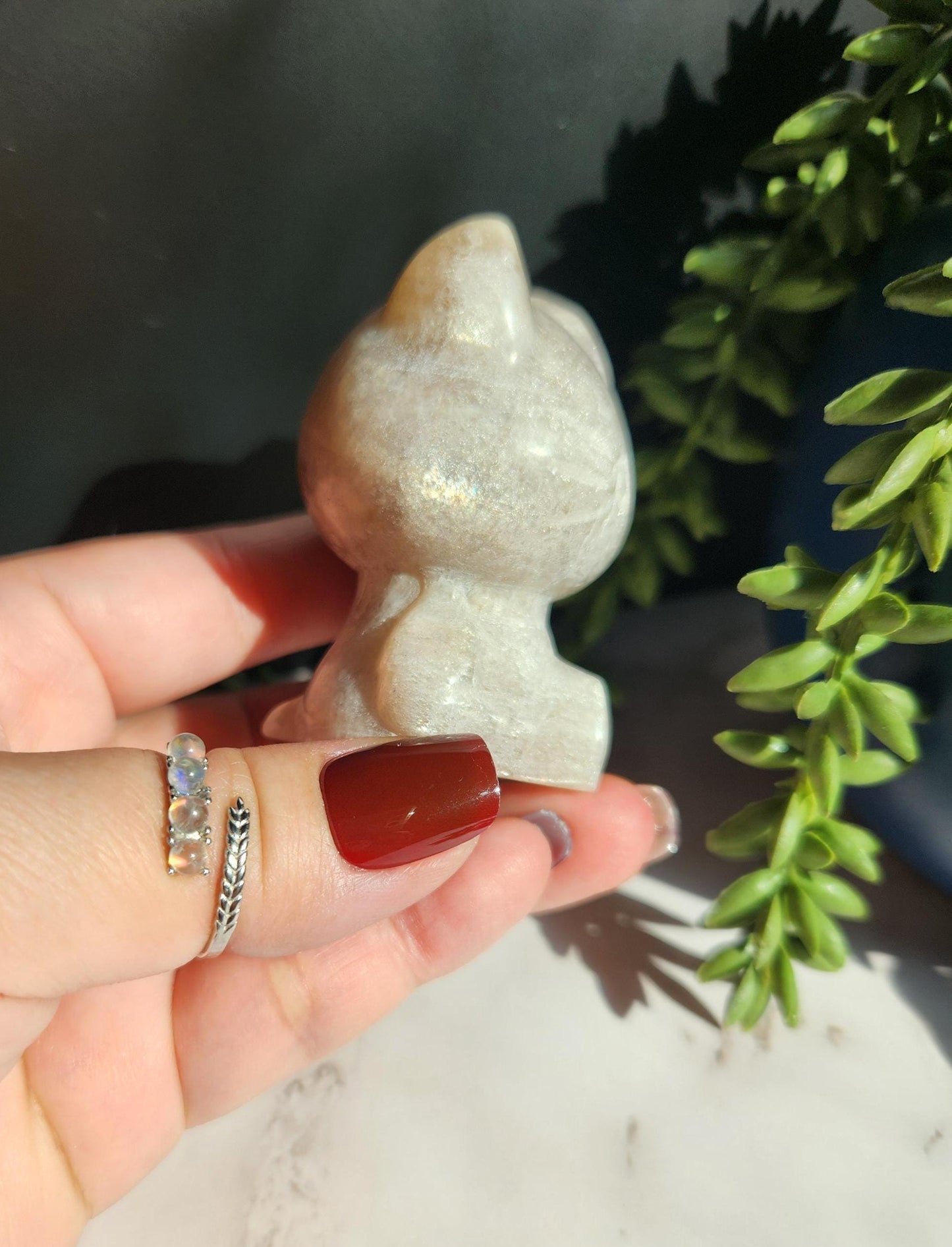 Beautiful blue moonstone hello kitty carving with amazing blue flash