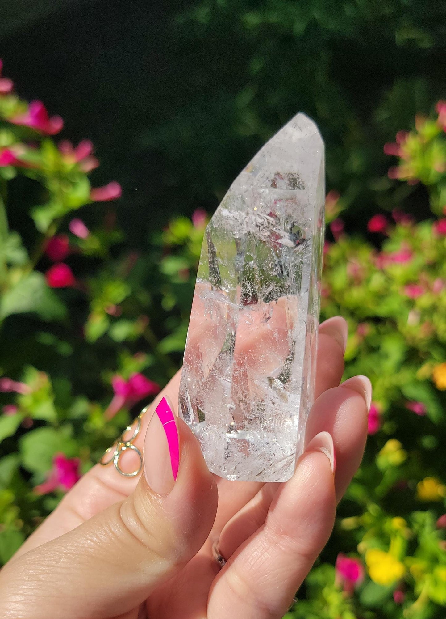 Beautiful high quality clear quartz tower with lots of rainbows from Brazil