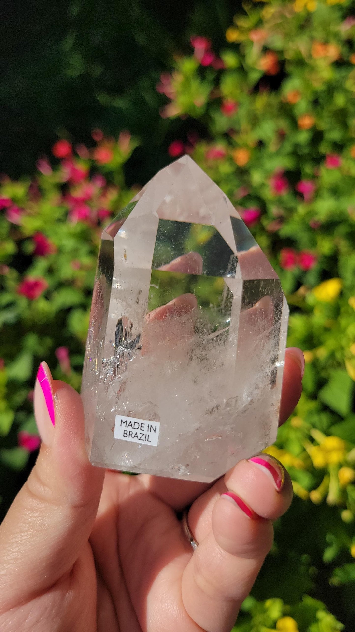 Beautiful high quality light smoky quartz tower with lots of rainbows and iron inclusions from Brazil