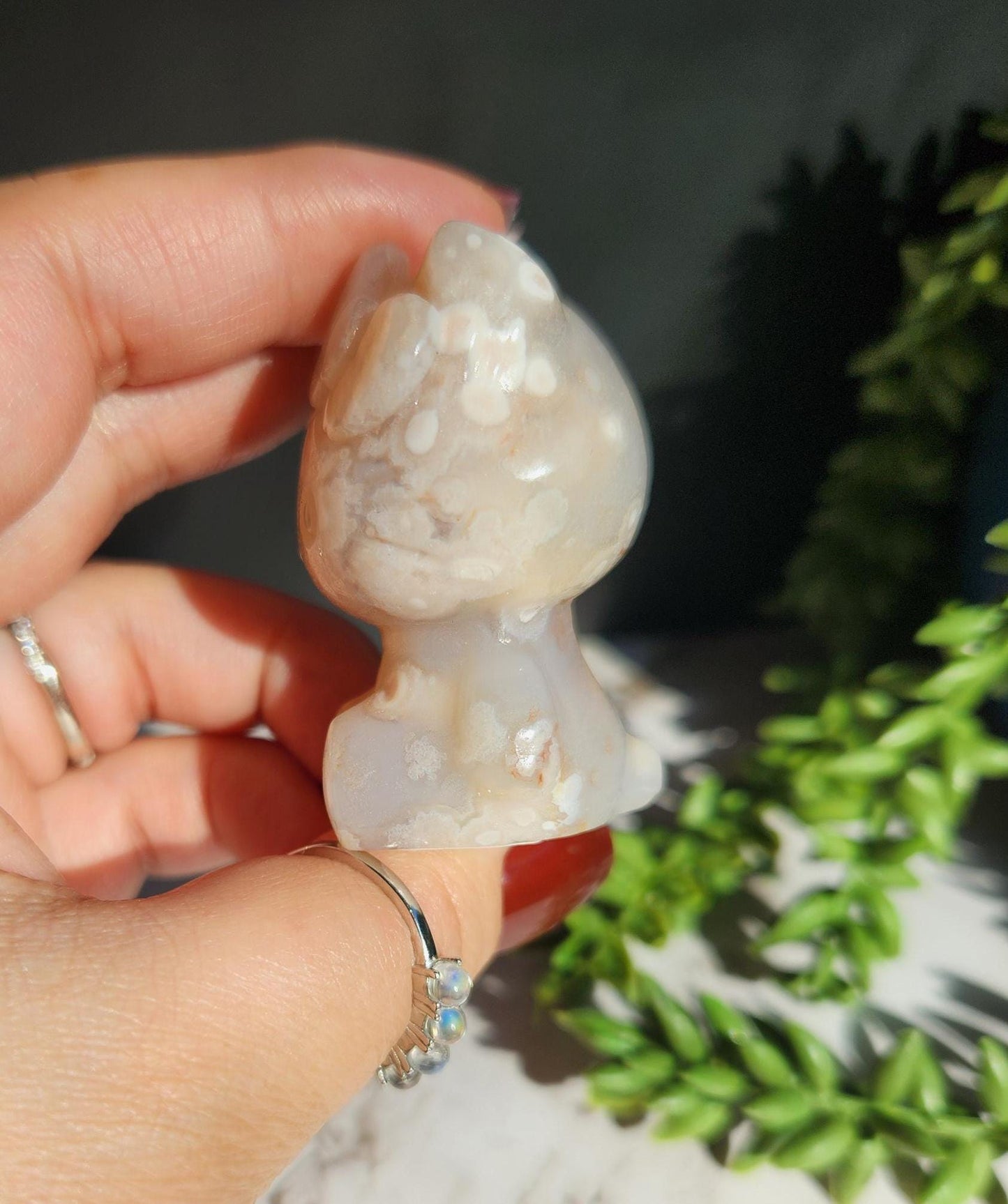 Beautiful flower agate hello kitty carving with a druzy, natural