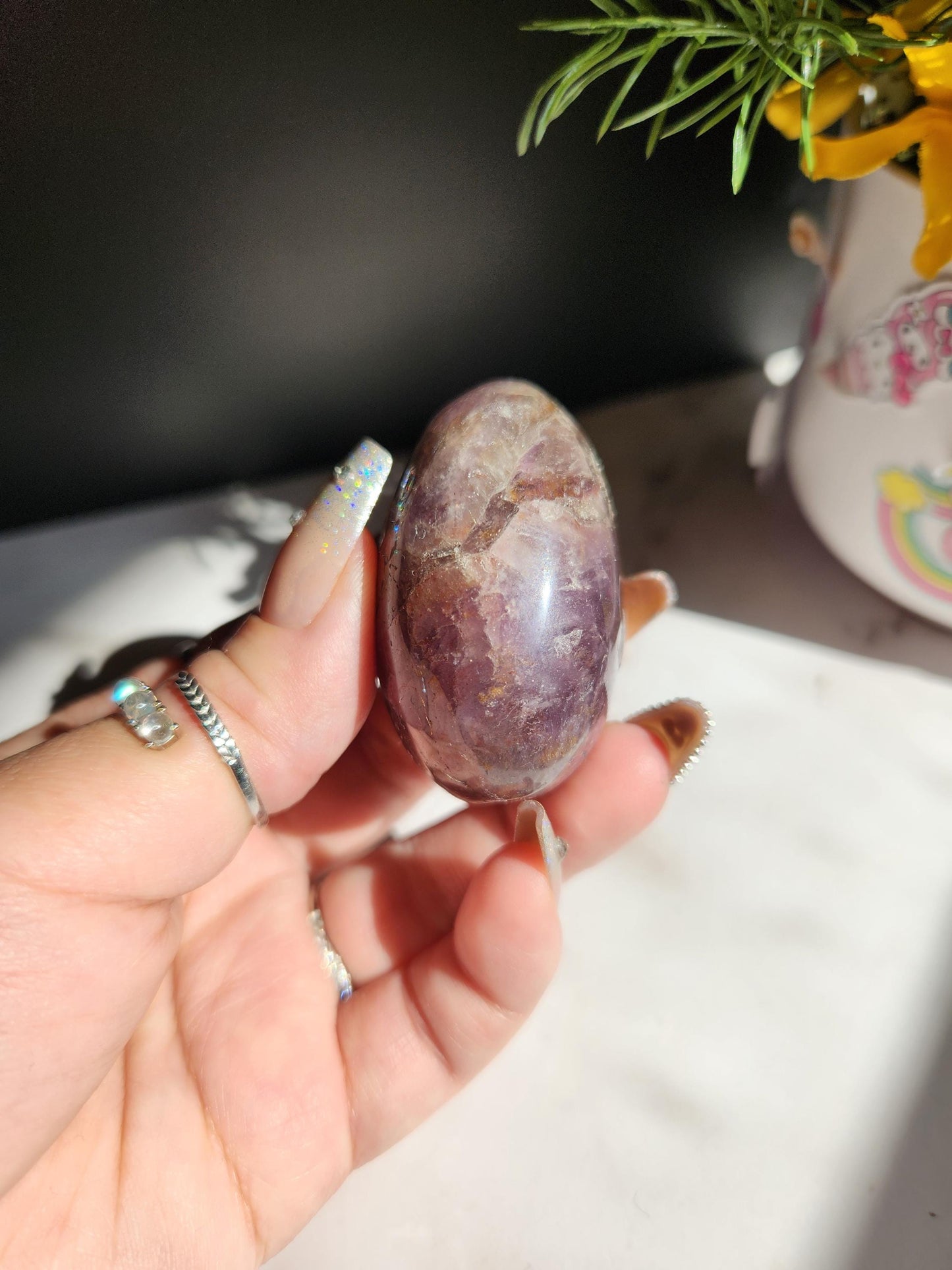 Rare natural super seven palm stone from Brazil 26D