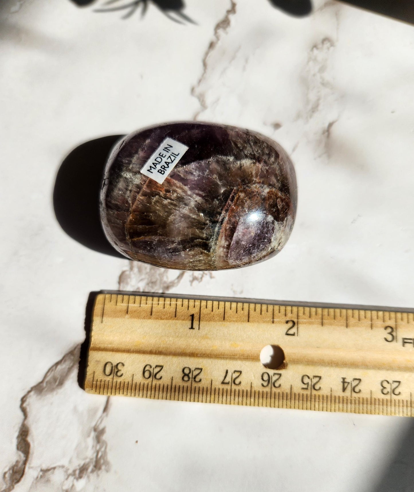 Rare natural super seven palm stone from Brazil 26D