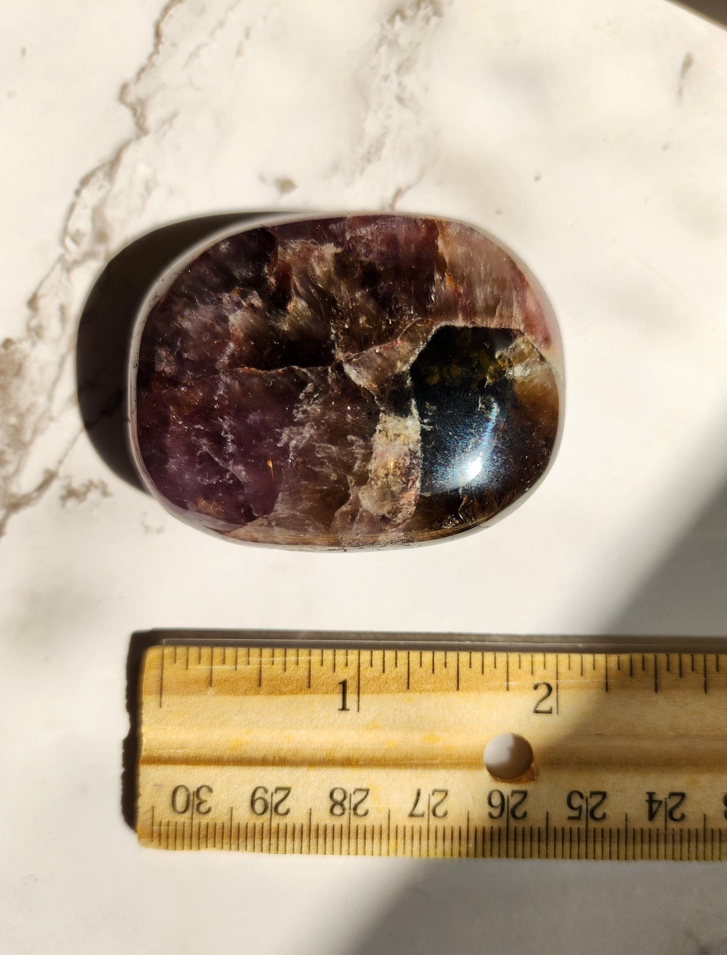 Rare natural super seven palm stone from Brazil 25E