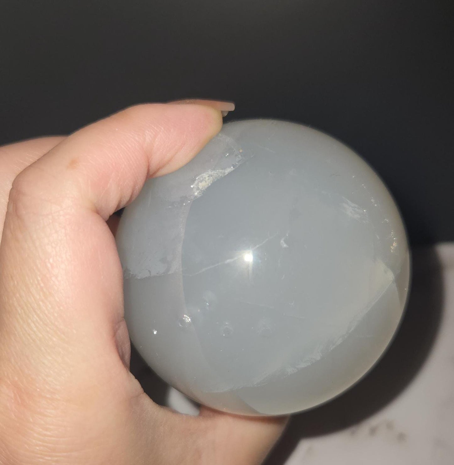 Beautiful blue rose quartz sphere with inclusions and rainbows 67.2mm