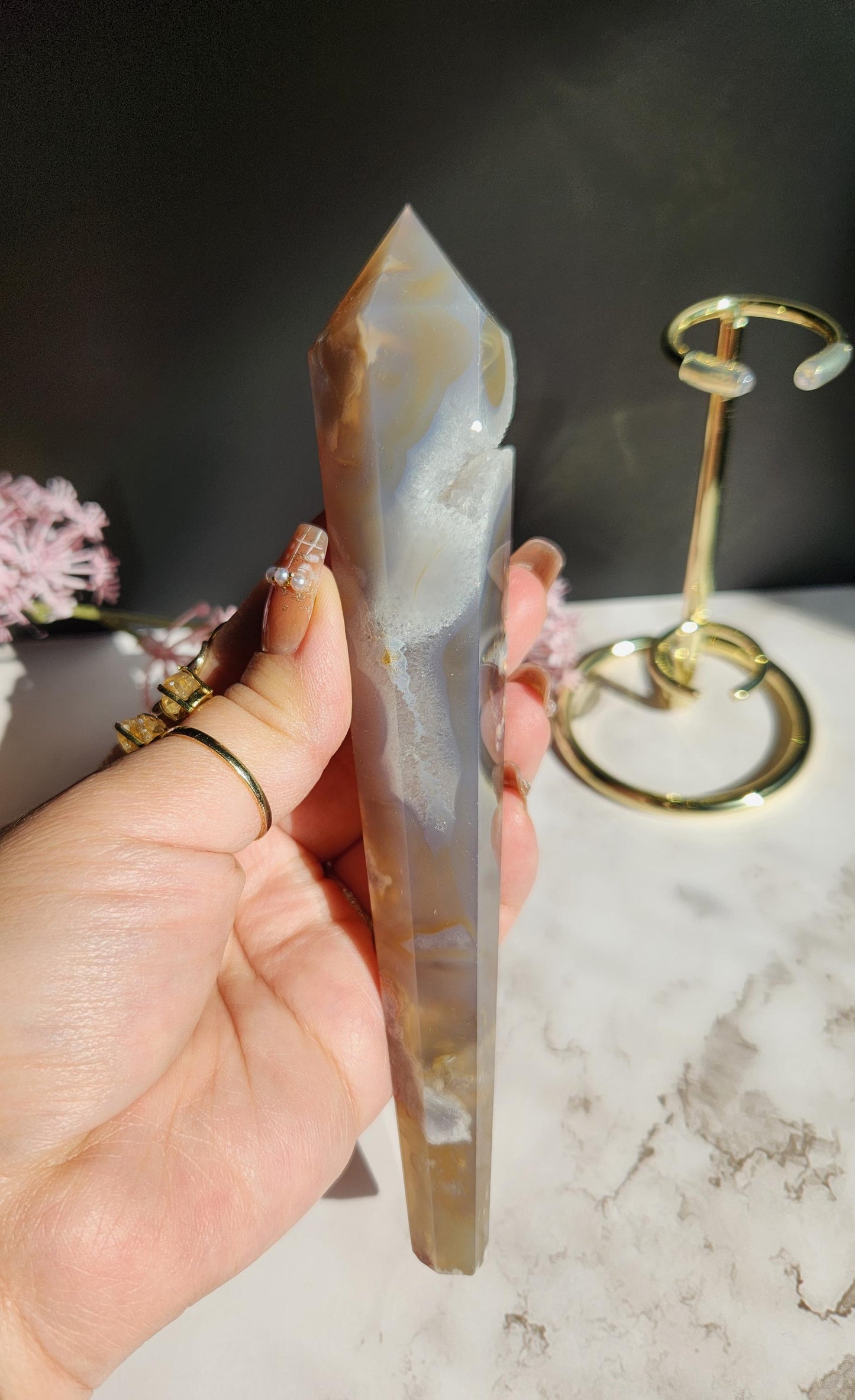 Natural black flower agate wand with stand, has sparkly druzy and black chalcedony from Madagascar