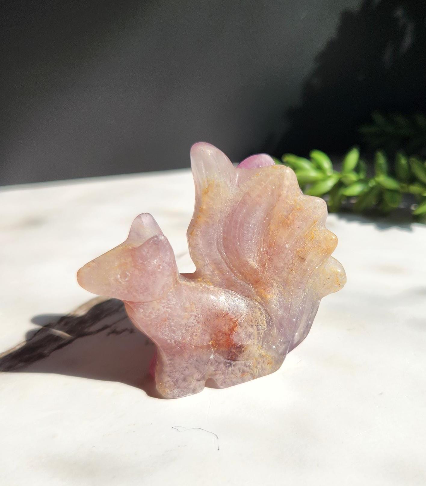 Natural fluorite 9 tail fox carving with golden healer inclusions
