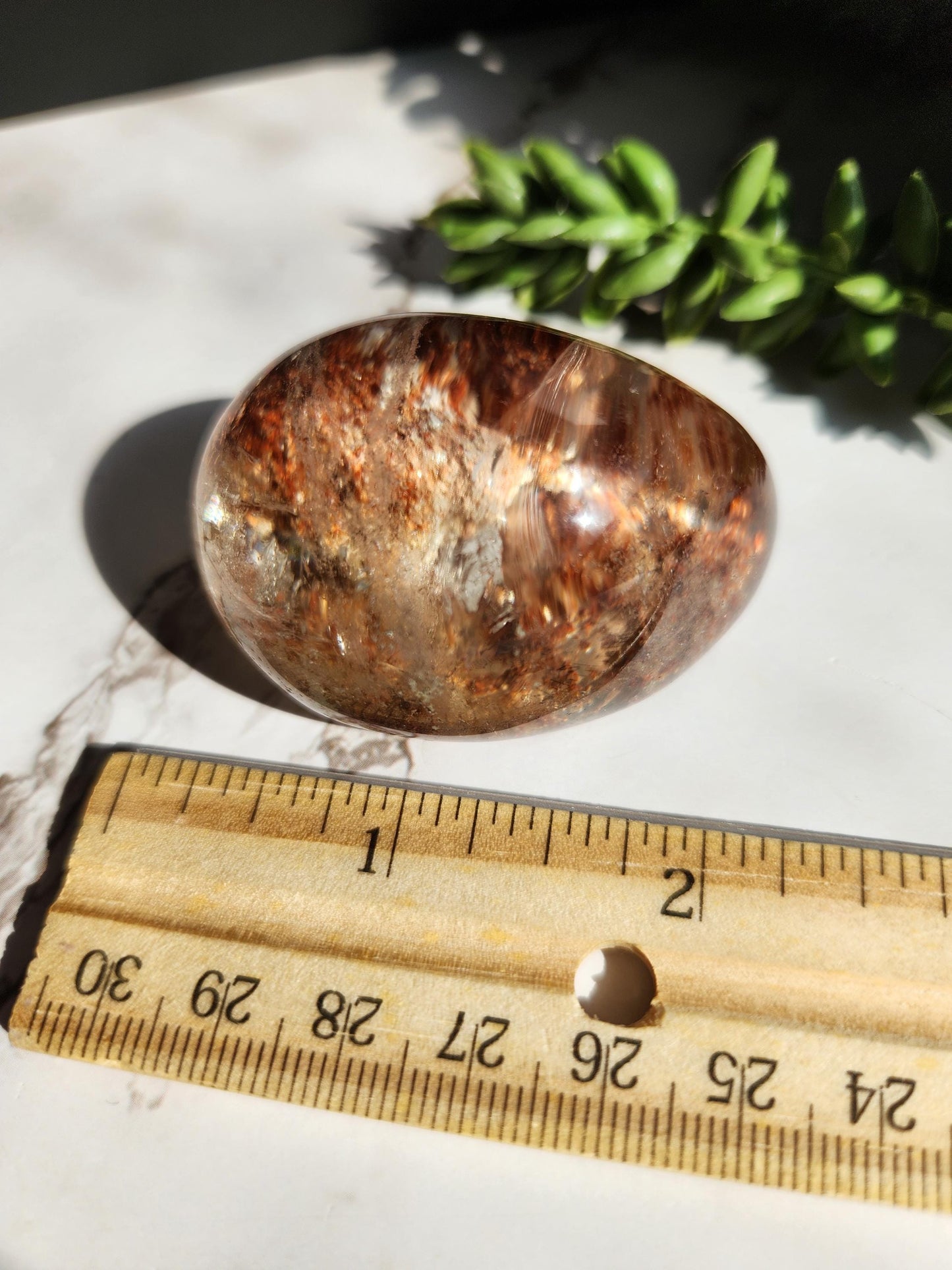 Natural lodolite garden quartz lens from Brazil, half polish and half raw