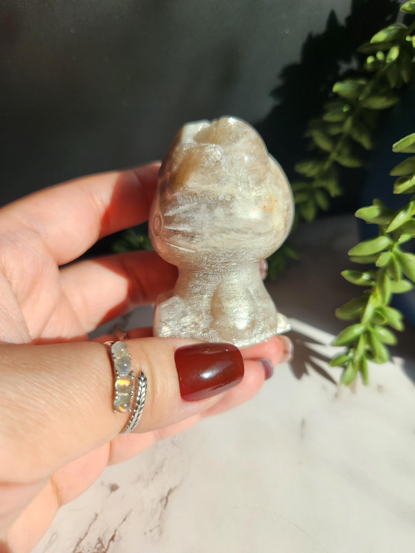 Beautiful blue moonstone hello kitty carving with amazing blue flash