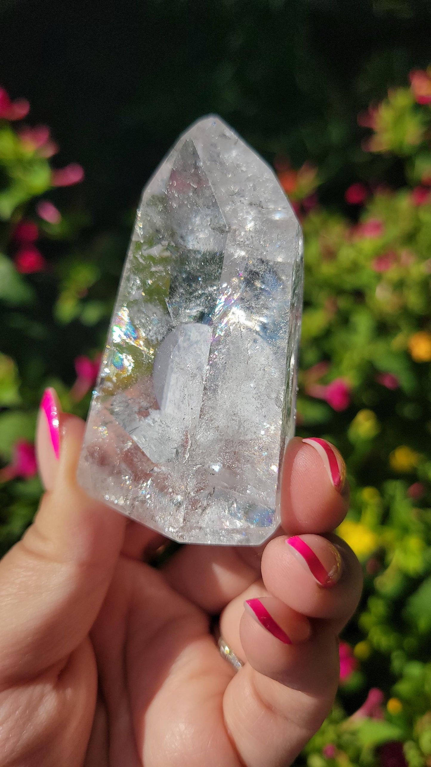 Beautiful high quality clear quartz tower with lots of rainbows from Brazil