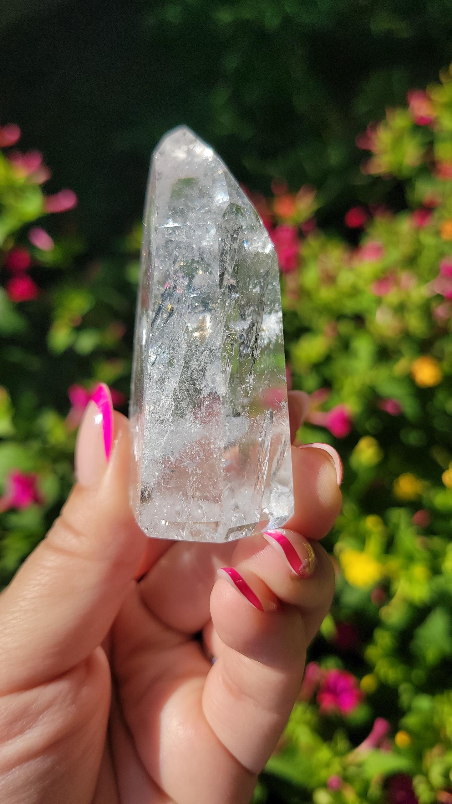 Beautiful high quality clear quartz tower with lots of rainbows from Brazil