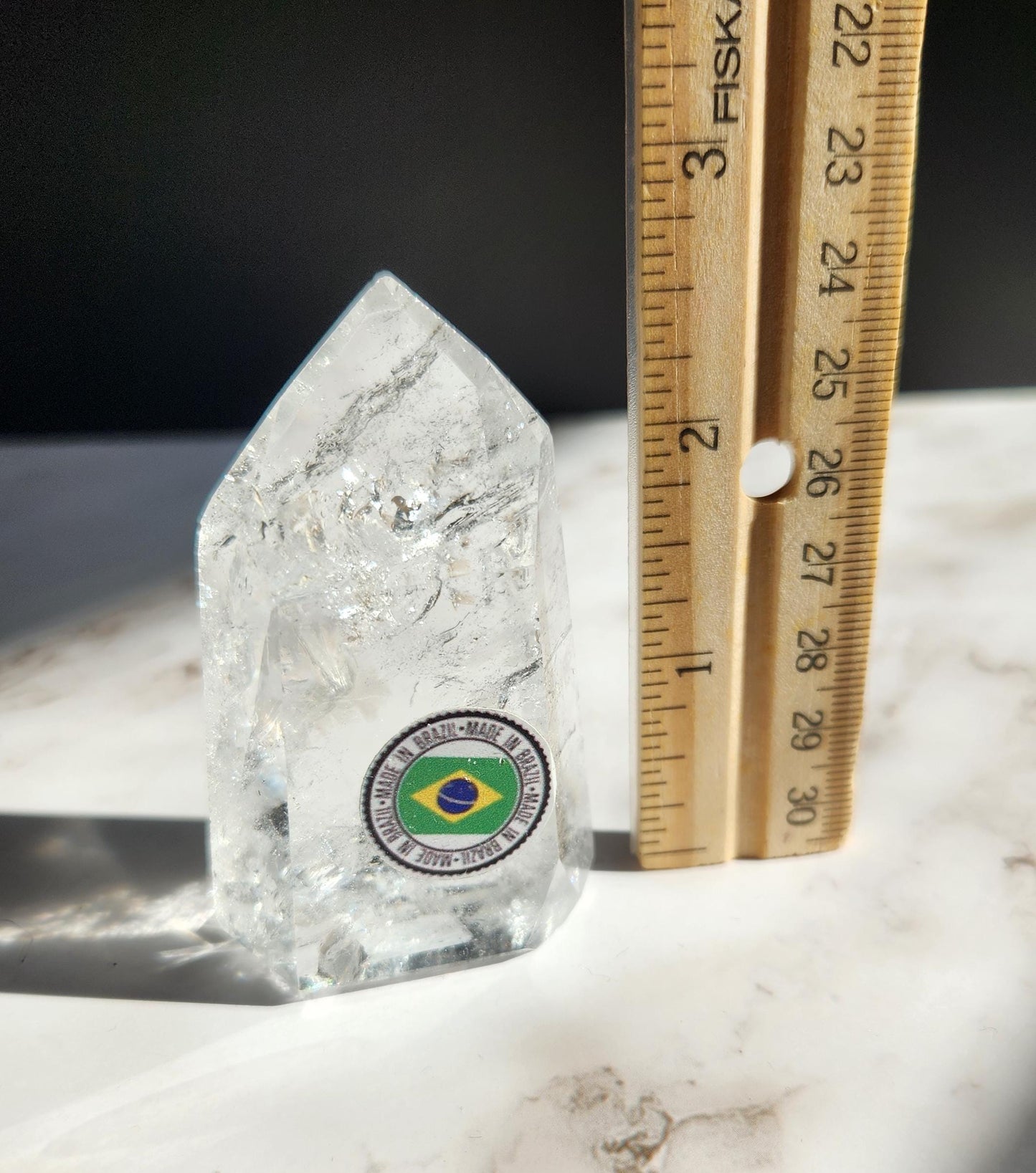 Beautiful high quality clear quartz tower with lots of rainbows from Brazil