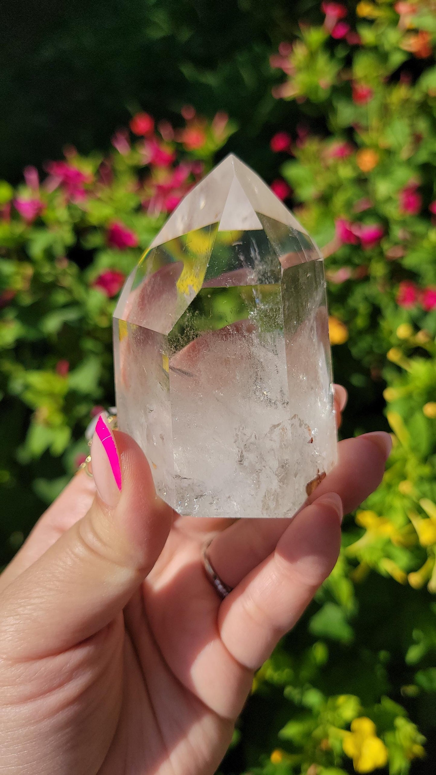 Beautiful high quality light smoky quartz tower with lots of rainbows and iron inclusions from Brazil