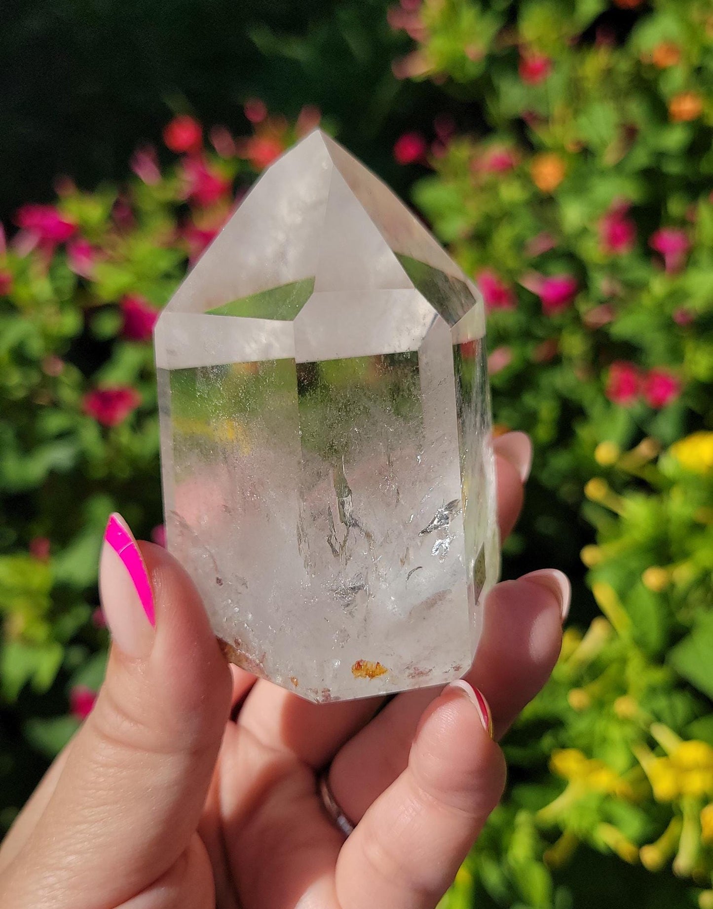 Beautiful high quality light smoky quartz tower with lots of rainbows and iron inclusions from Brazil