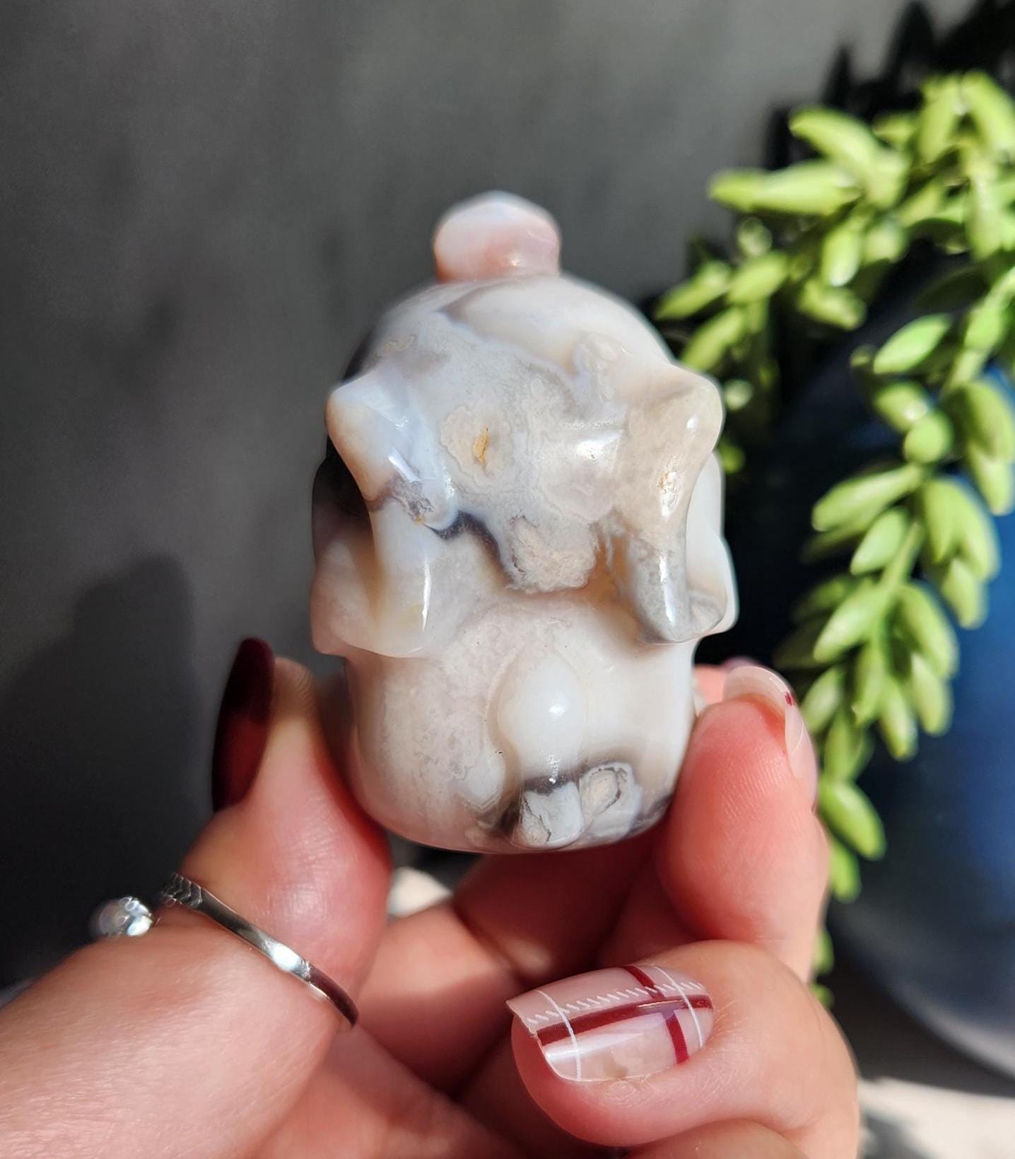 Beautiful happy hand carved carnelian flower agate elephant with black chalcedony, natural