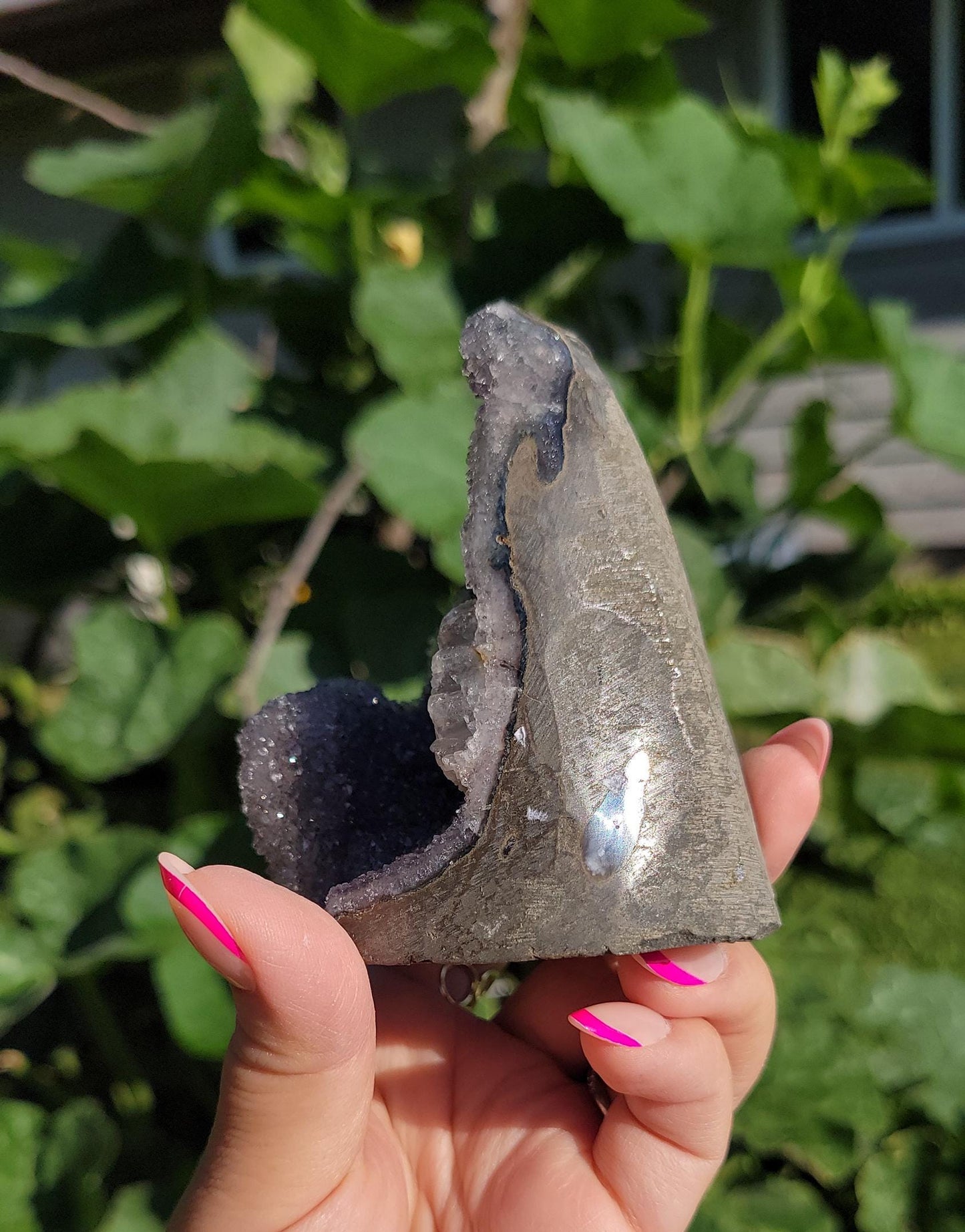Lavender gray rainbow amethyst cutbase with calcite from Uruguay, natural color