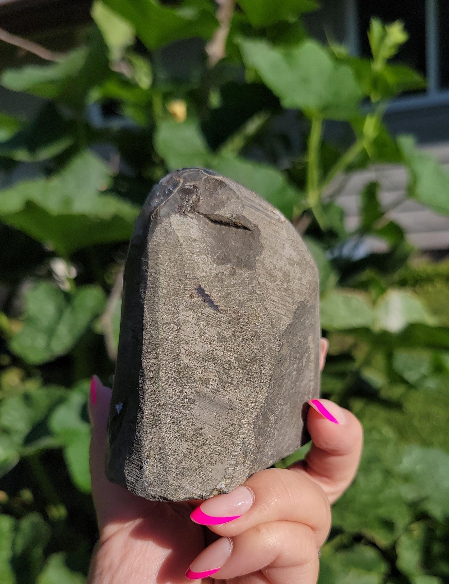 Lavender gray rainbow amethyst cutbase with calcite from Uruguay, natural color