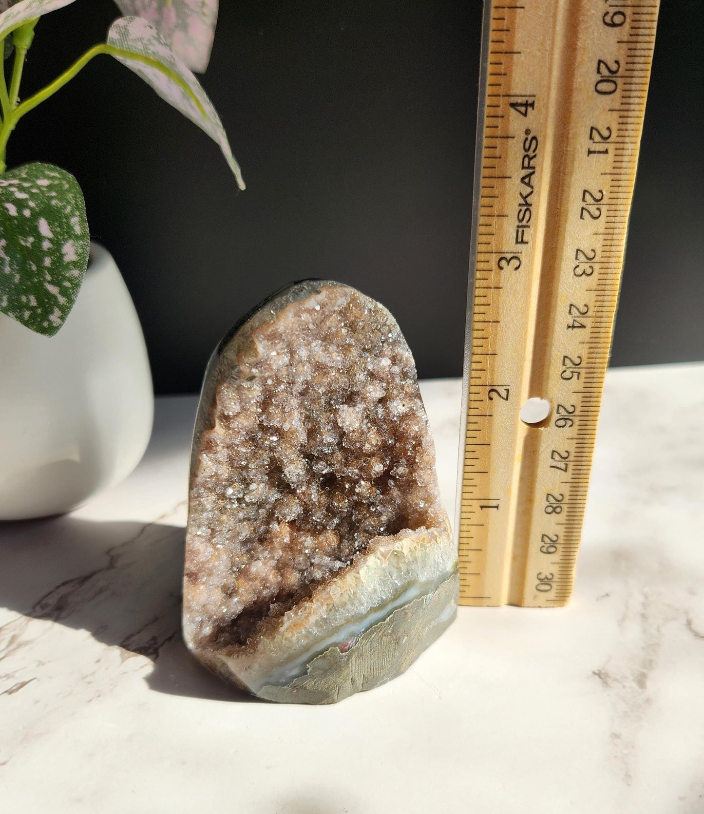 Sparkly rainbow amethyst cutbase from Uruguay, natural color