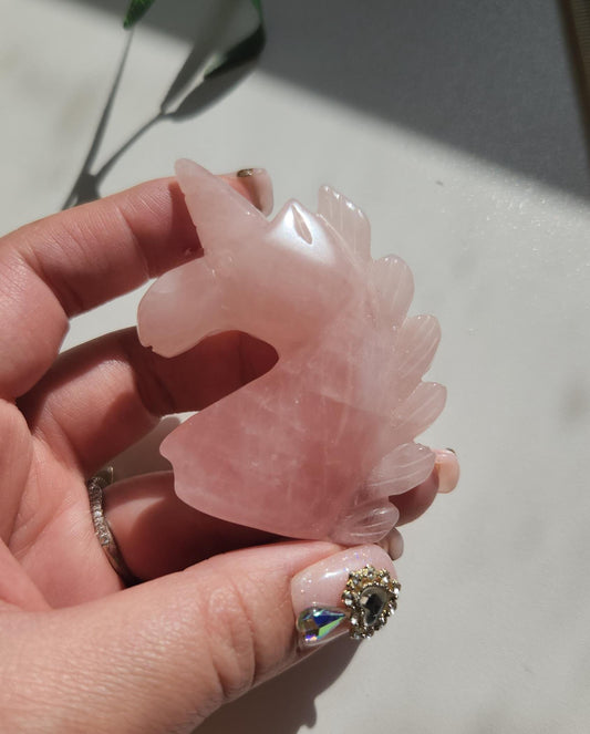 Pretty pink rose quartz unicorn carving
