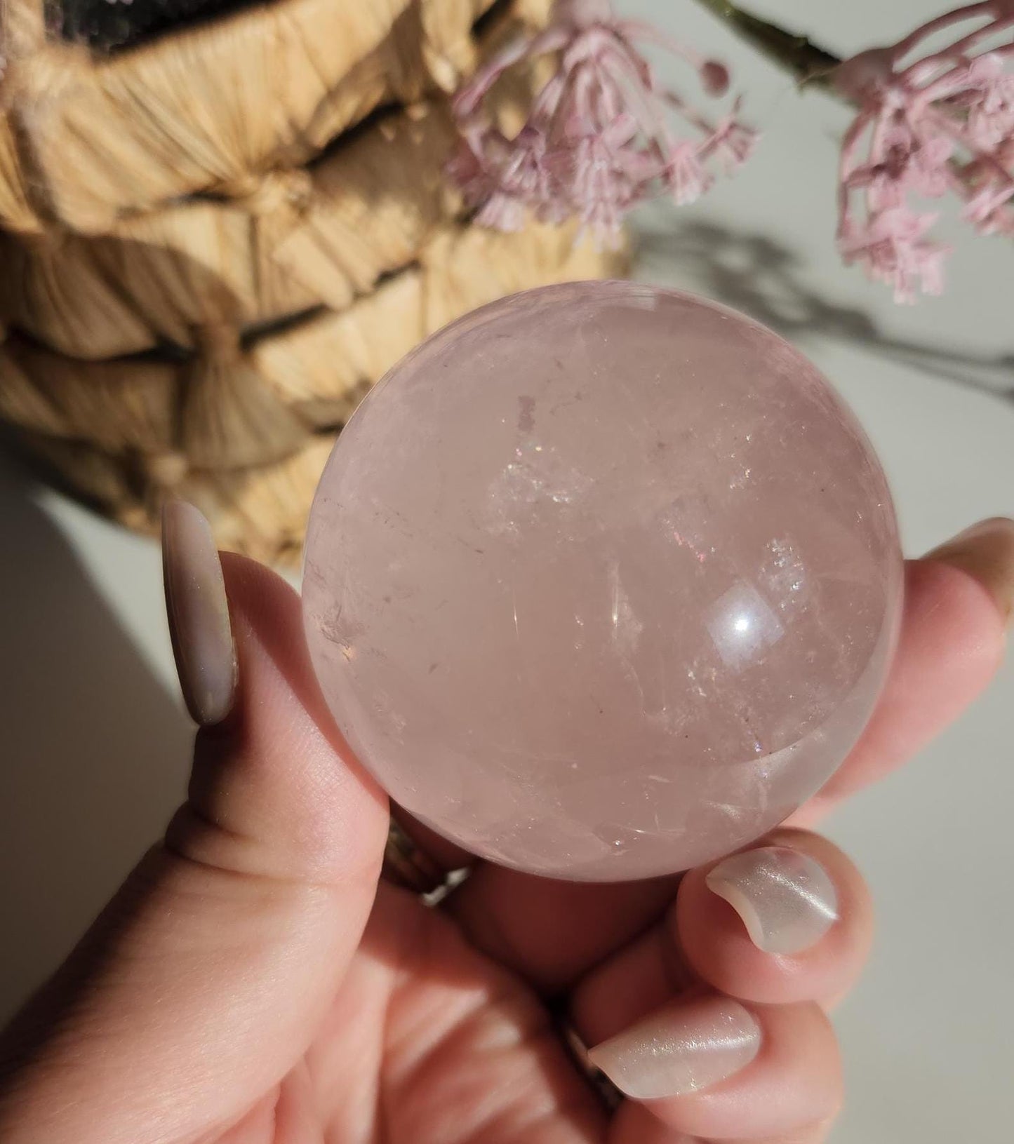 High quality 6 star rose quartz sphere, translucent with inclusions and rainbows from Mozambique  H50