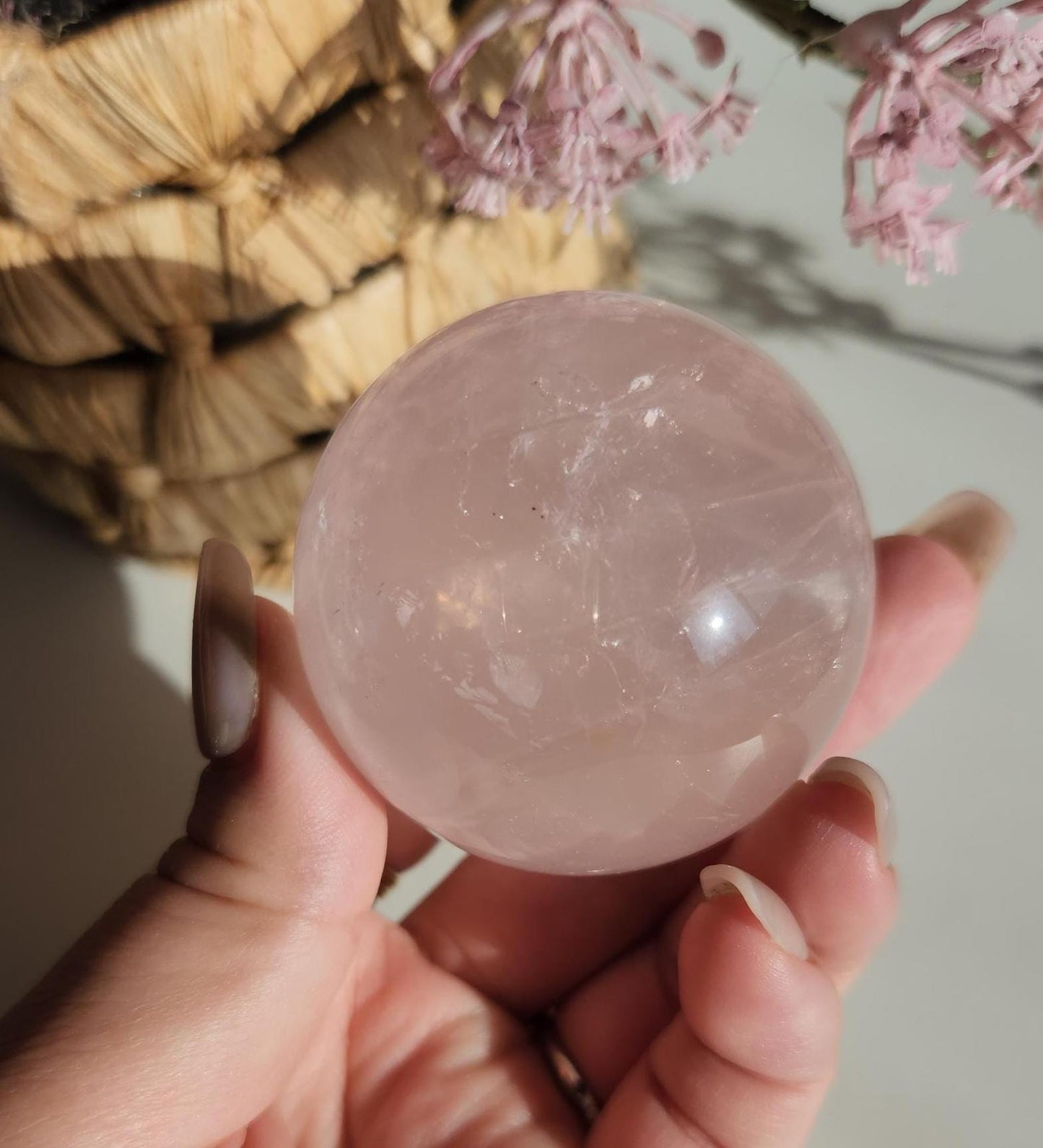 High quality 6 star rose quartz sphere, translucent with inclusions and rainbows from Mozambique  H50