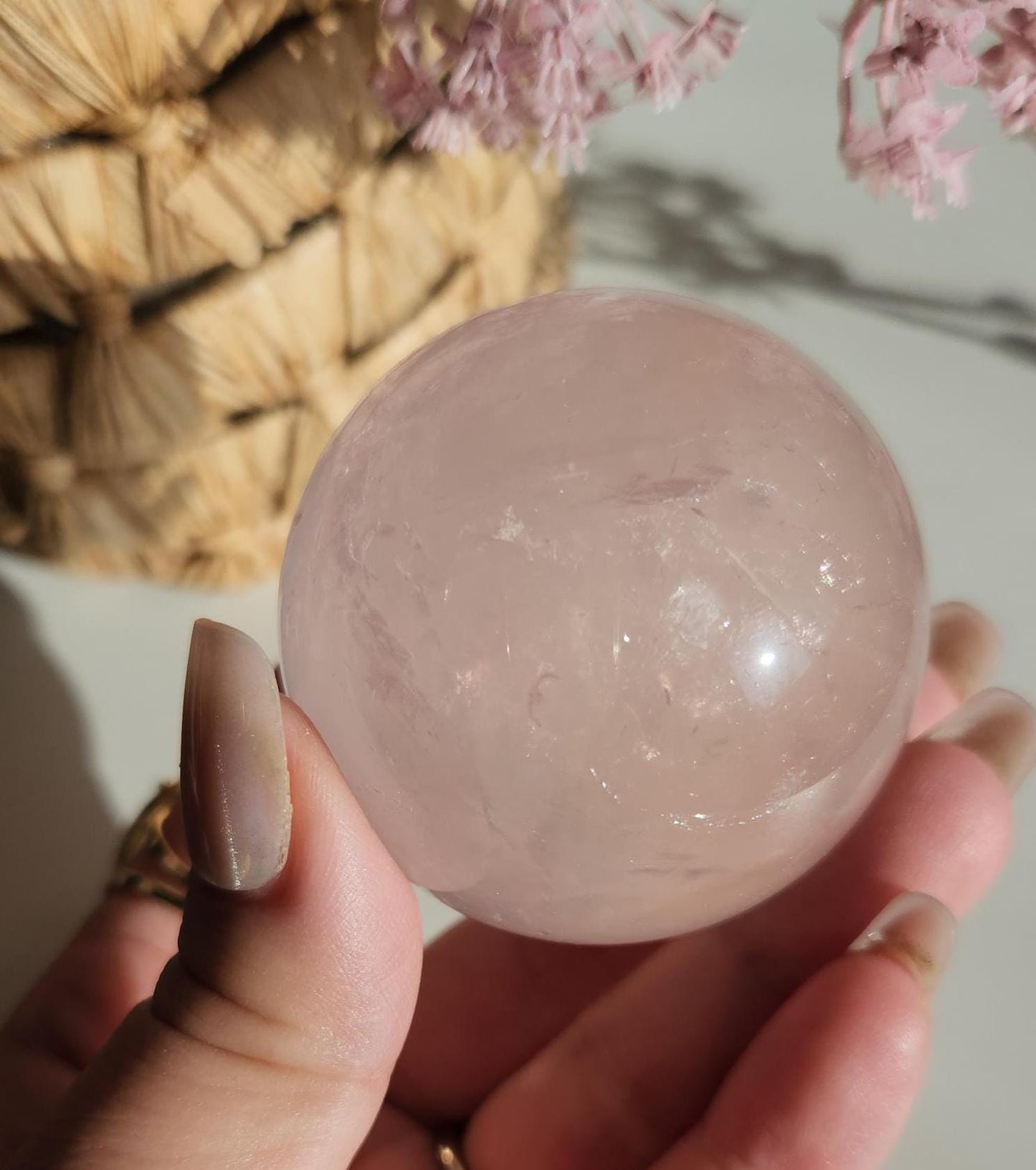 High quality 6 star rose quartz sphere, translucent with inclusions and rainbows from Mozambique  H50