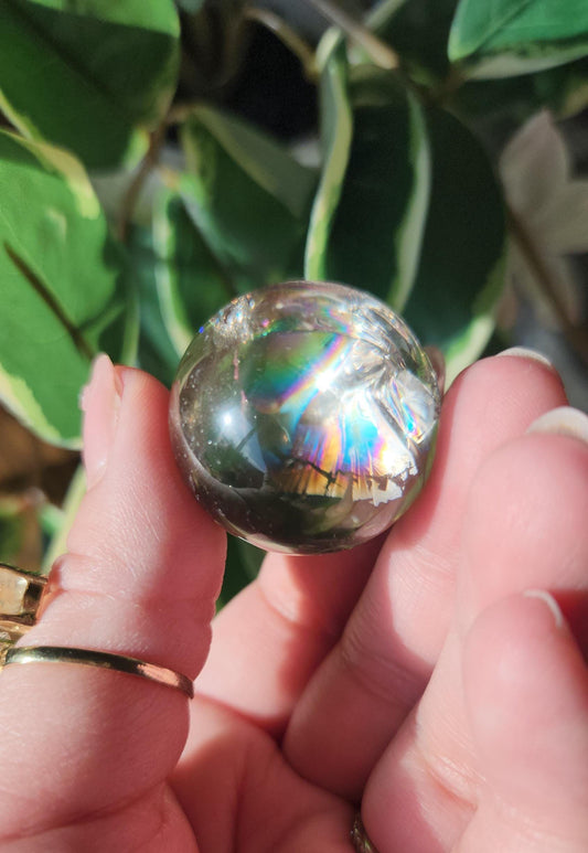 High quality natural light smoky quartz sphere with amazing rainbows