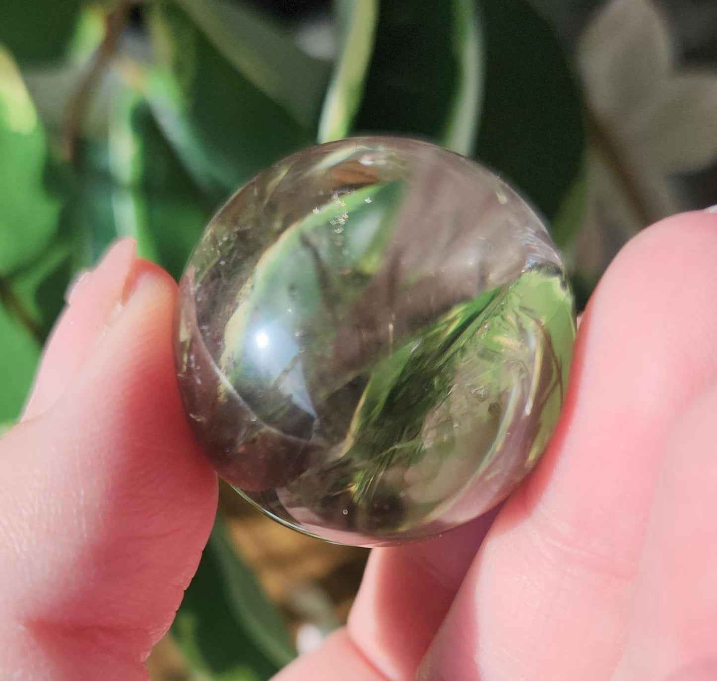 High quality natural light smoky quartz sphere with amazing rainbows