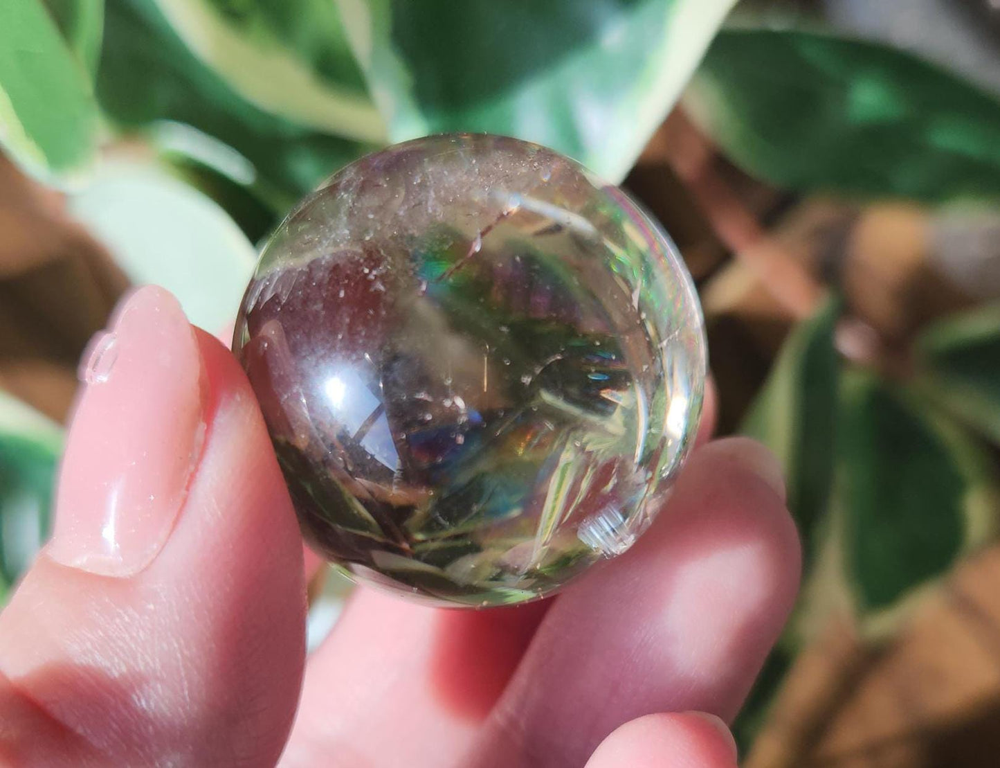 High quality natural light smoky quartz sphere with amazing rainbows