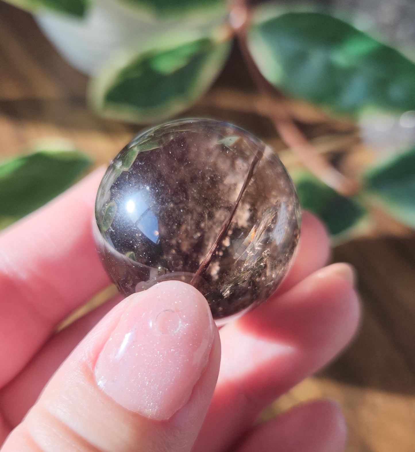 High quality natural dark smoky quartz sphere with amazing rainbows